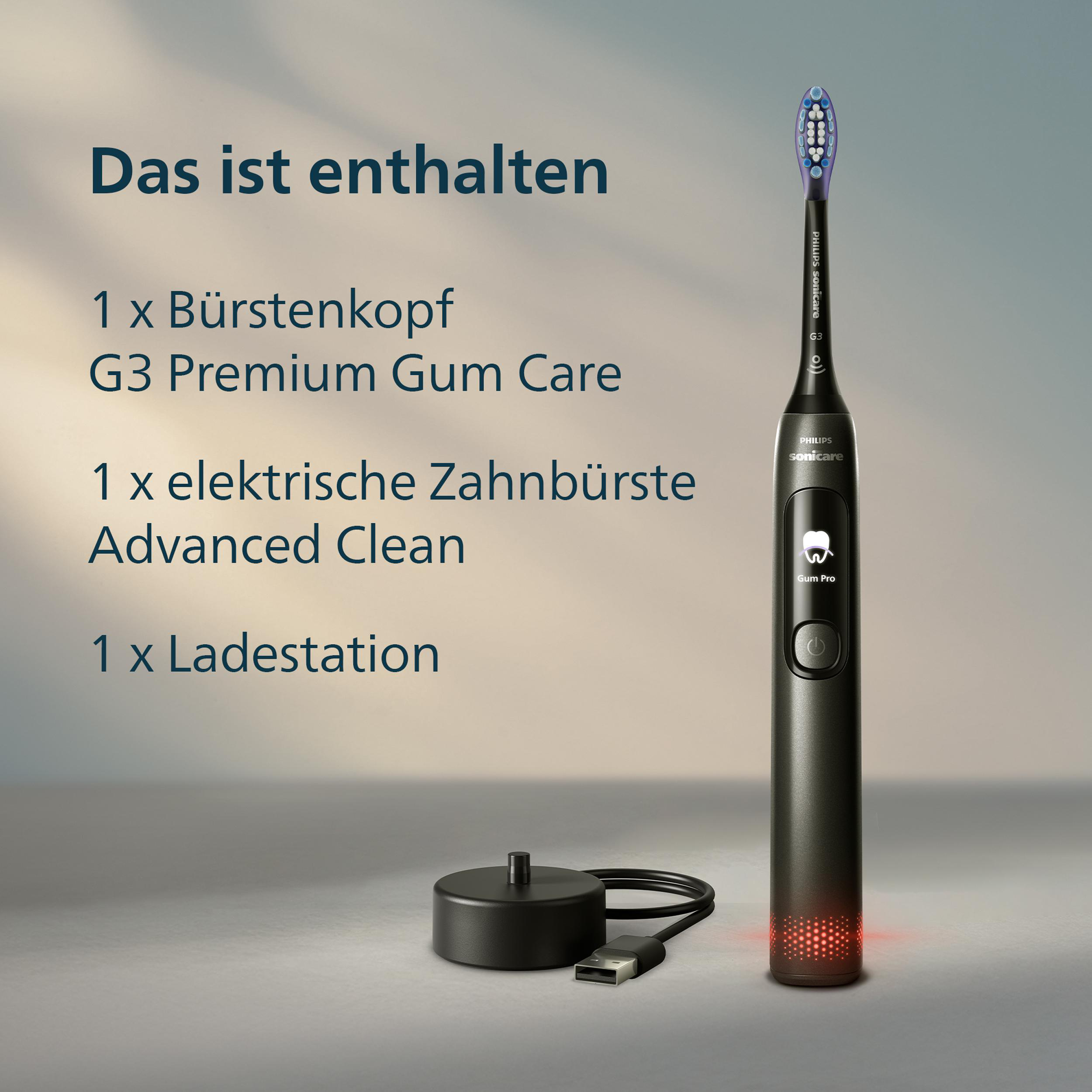 Eine elektrische Zahnbürste mit Bürstenkopf, Ladestation und Text auf Deutsch. Die Zahnbürste ist schwarz mit rotem Licht an der Basis.