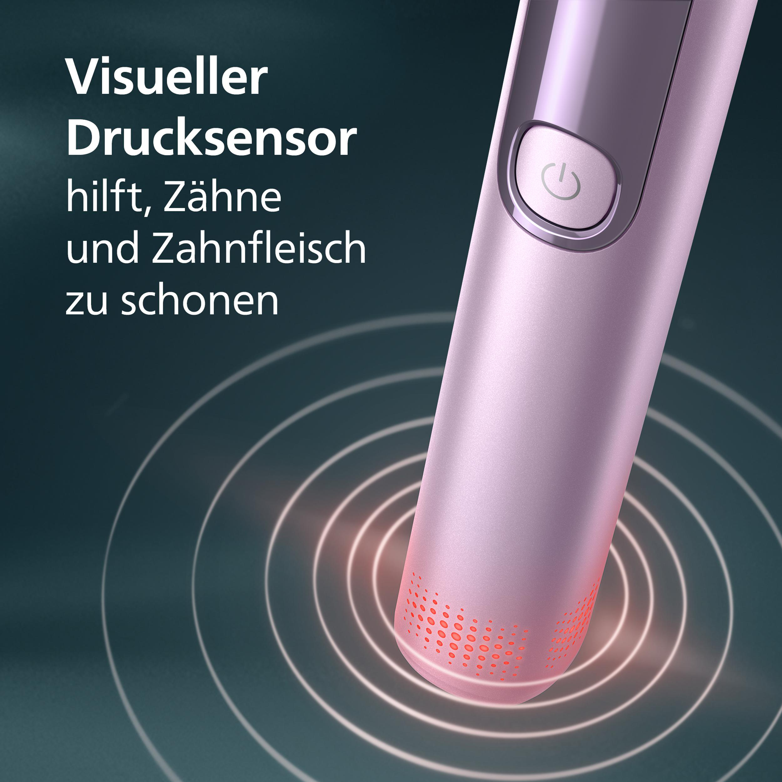 Eine rosa elektrische Zahnbürste mit Power-Taste und Sensor. Konzentrische Kreise strahlen vom Bürstenkopf aus.