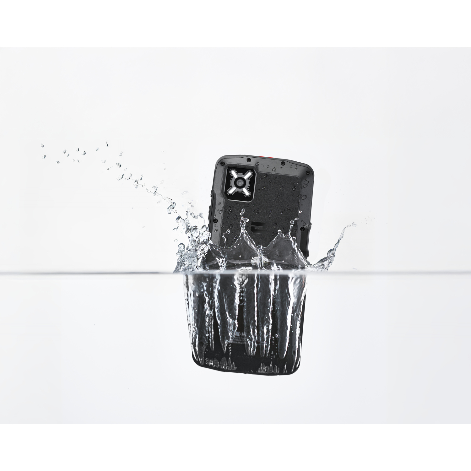 A black phone is submerged in water, creating a splash. Water droplets and waves surround the phone against a white background.