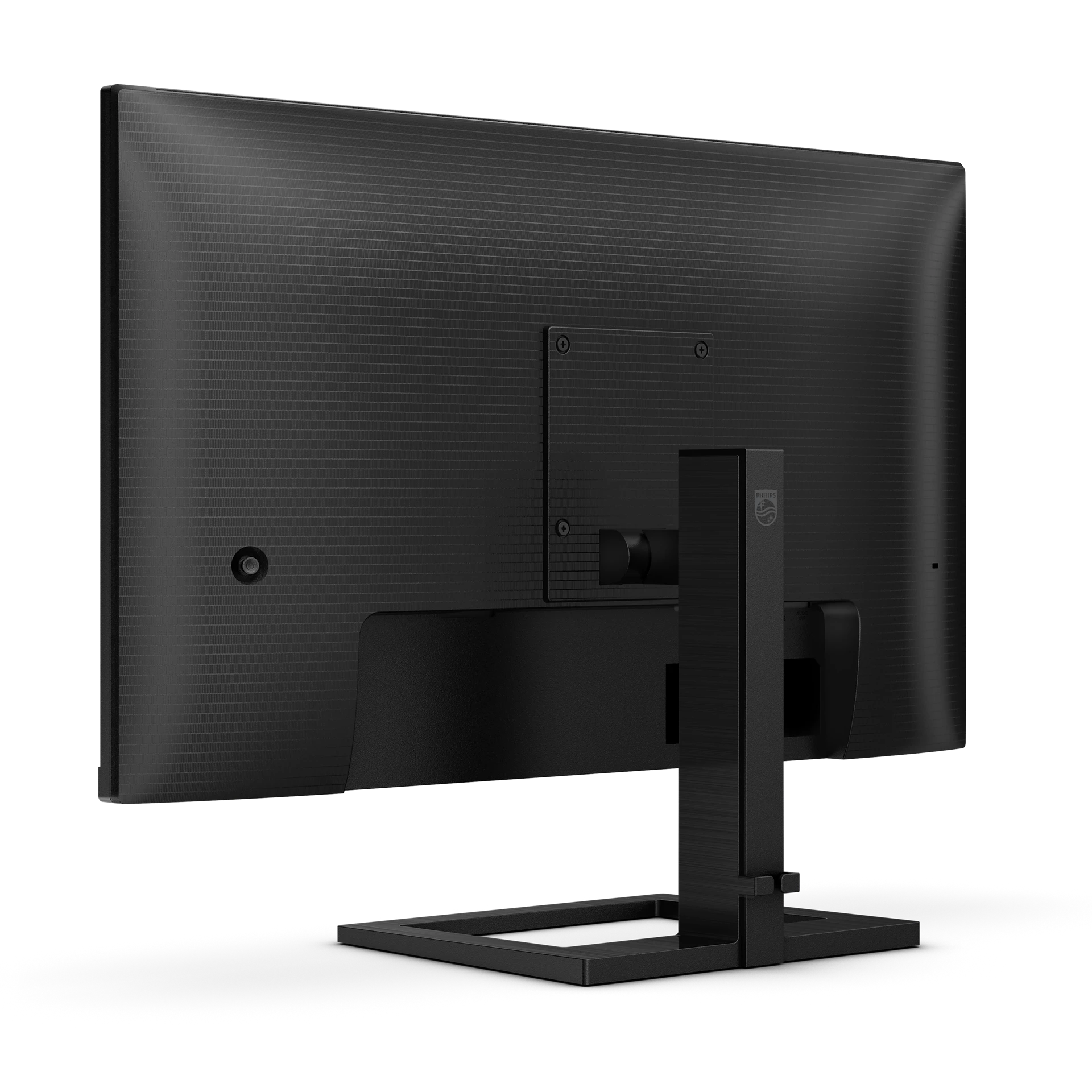 Parte trasera de un monitor Philips negro. Tiene un panel trasero texturizado y un soporte. El logotipo de Philips es visible.
