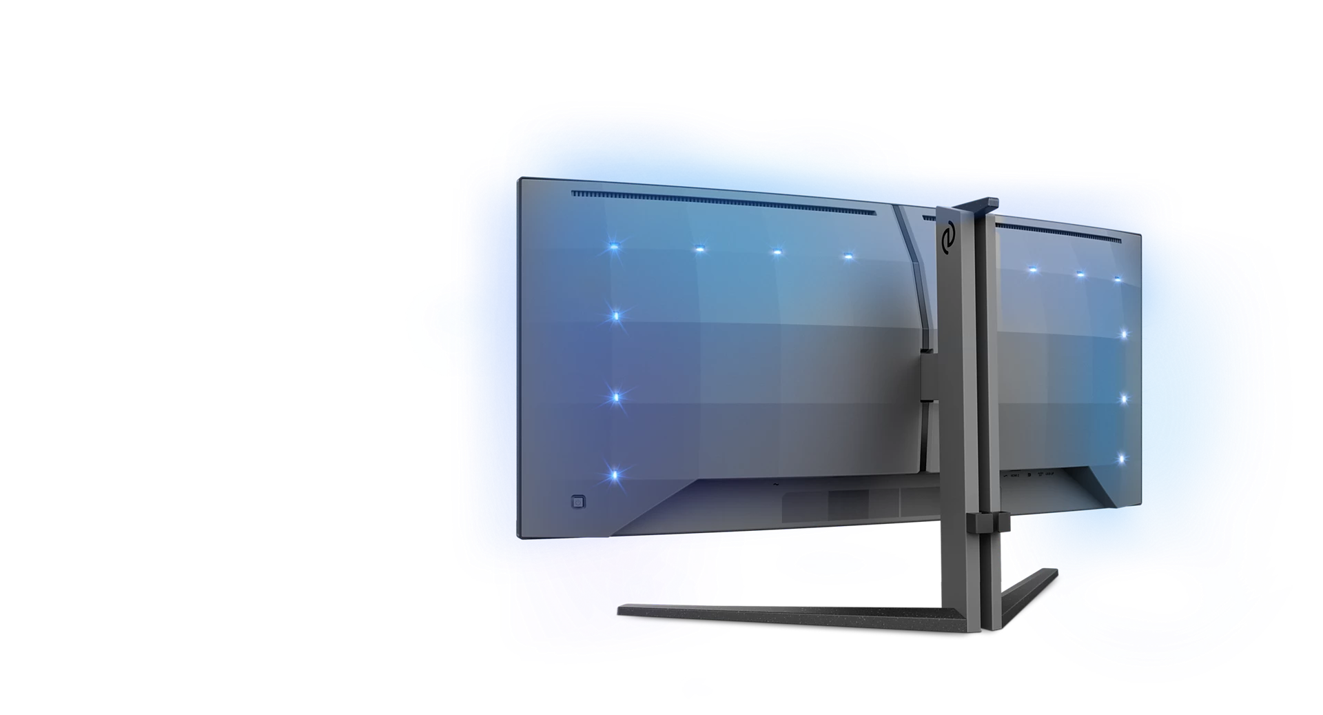 Se muestran dos monitores de ordenador, ligeramente angulados. Son grises, con luces brillantes y un soporte negro sobre un fondo azul.