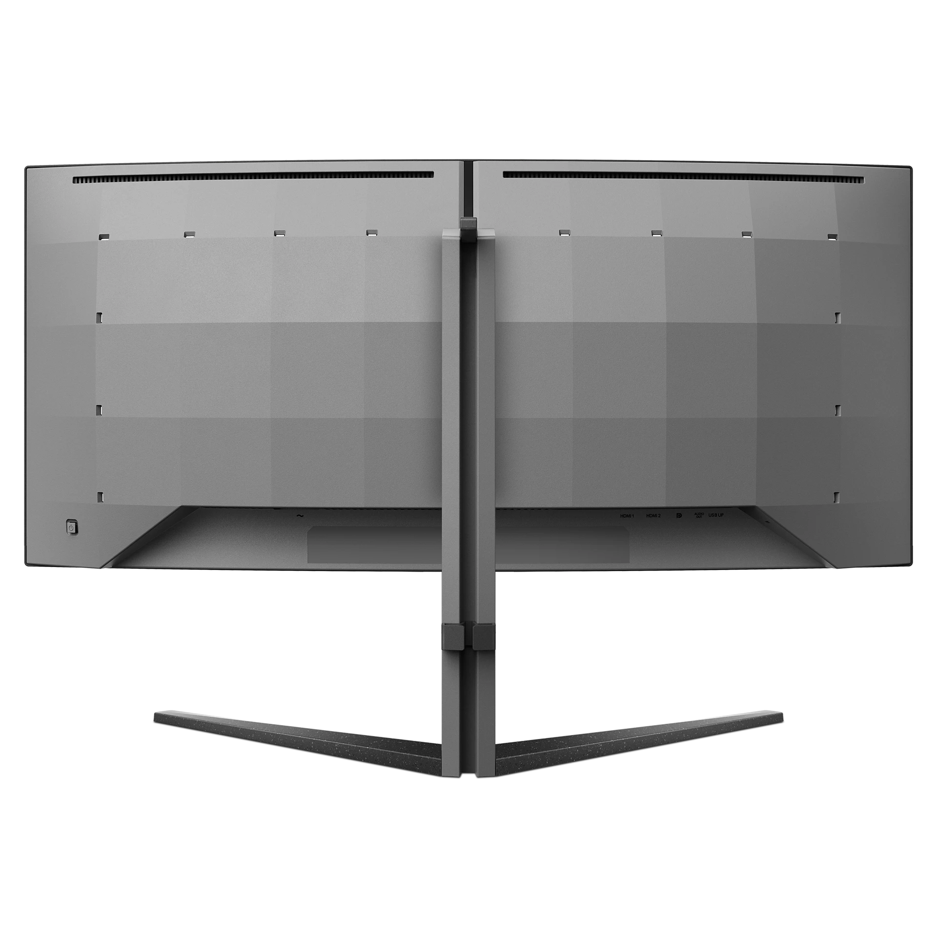Vista trasera de monitores curvos duales. Carcasa de metal gris con soporte. Puertos HDMI y USB visibles.