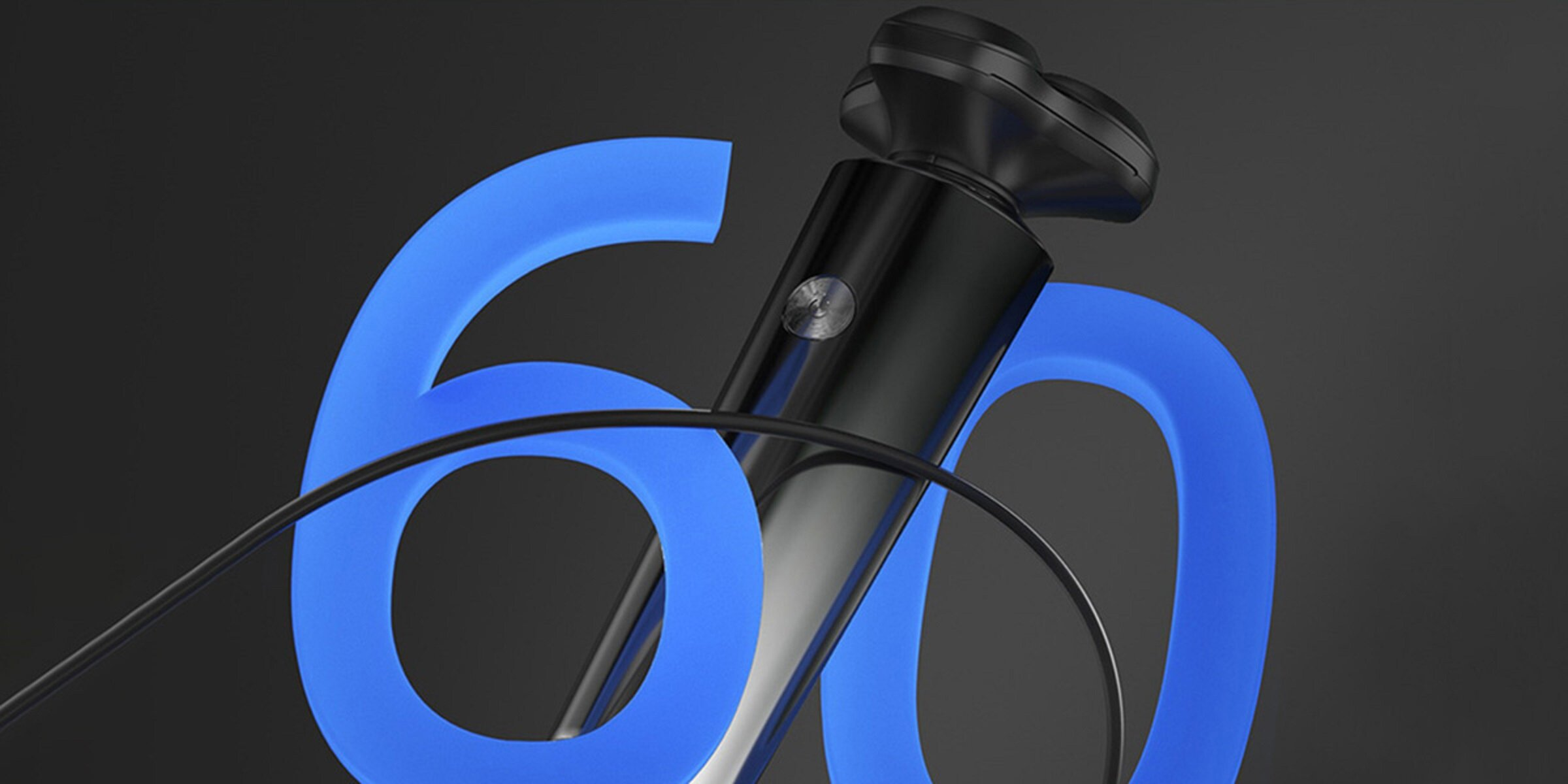 Czarna golarka przed niebieską liczbą 60, na ciemnoszarym tle i czarnym drucie.