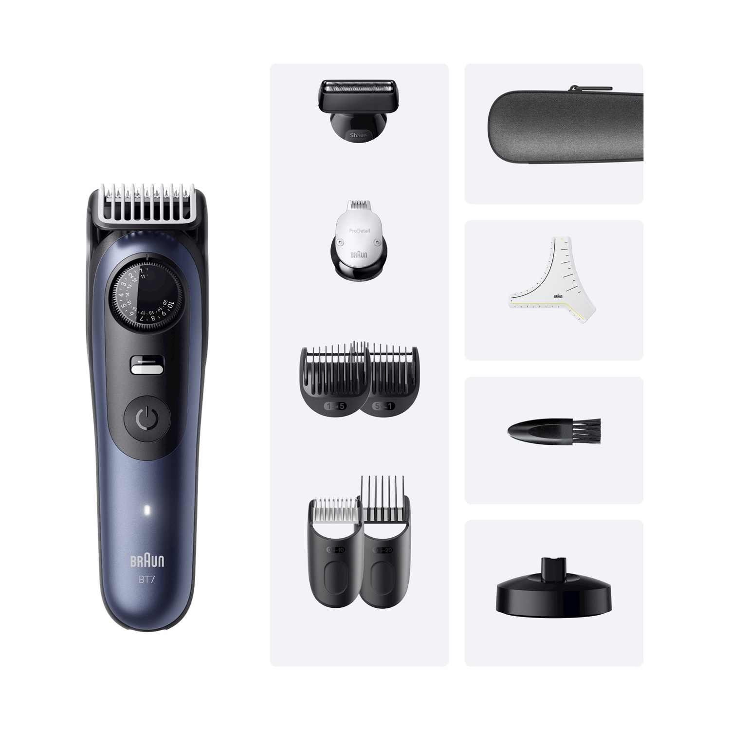 Un regolabarba Braun BT7 blu e nero con vari accessori, tra cui testine, guide e una custodia da viaggio, su sfondo bianco.