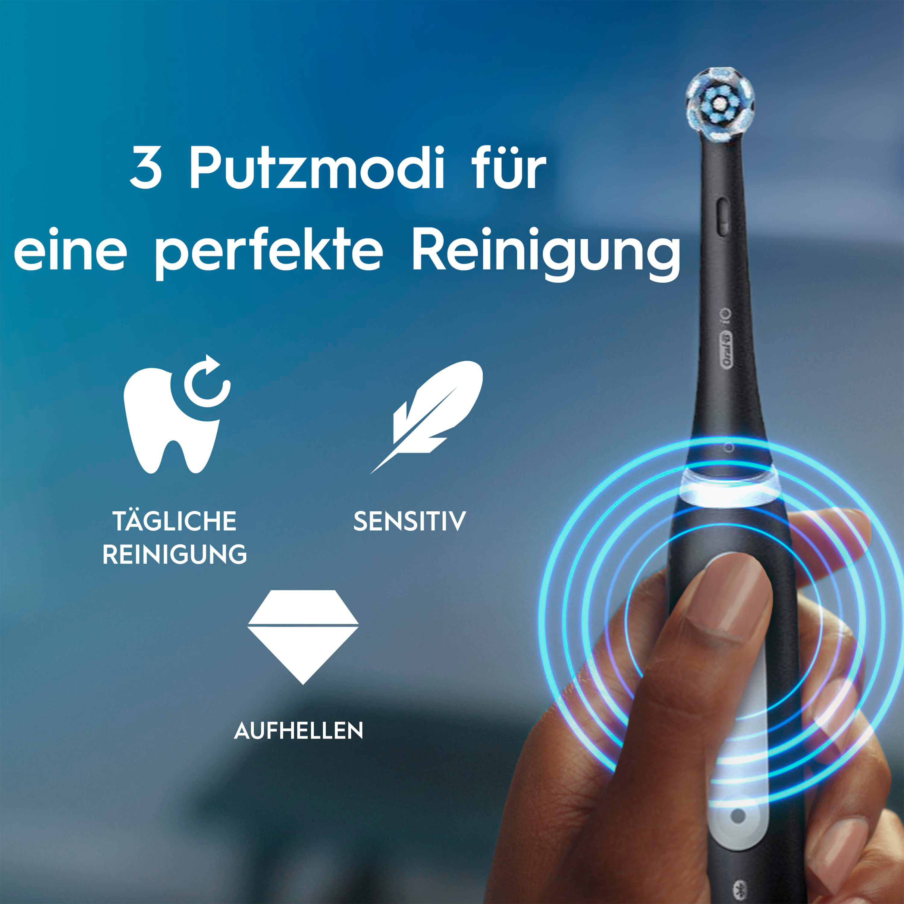 Eine schwarze elektrische Zahnbürste in einer Hand. Text lautet: '3 Putzmodi für perfekte Reinigung'.