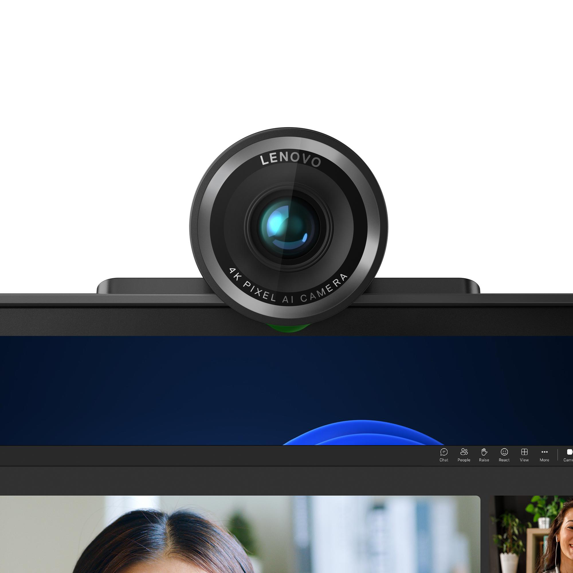 Eine Lenovo-Webcam ist an einem Monitor befestigt. Das Kameraobjektiv ist zentriert, mit der Aufschrift 4K Pixel AI Camera.
