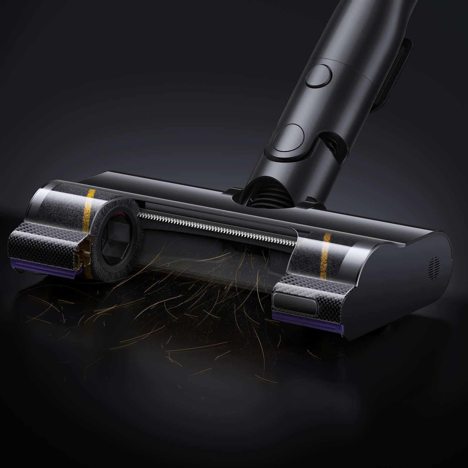 Close-up of a black vacuum cleaner head with a transparent section. Yellow and purple accents. Dust particles are visible, demonstrating use.