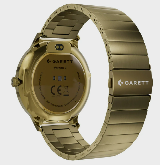 Złoty smartwatch, widok z tyłu, z metalową bransoletą. Tarcza wyświetla 'GARETT Verona 2' i inne szczegóły.