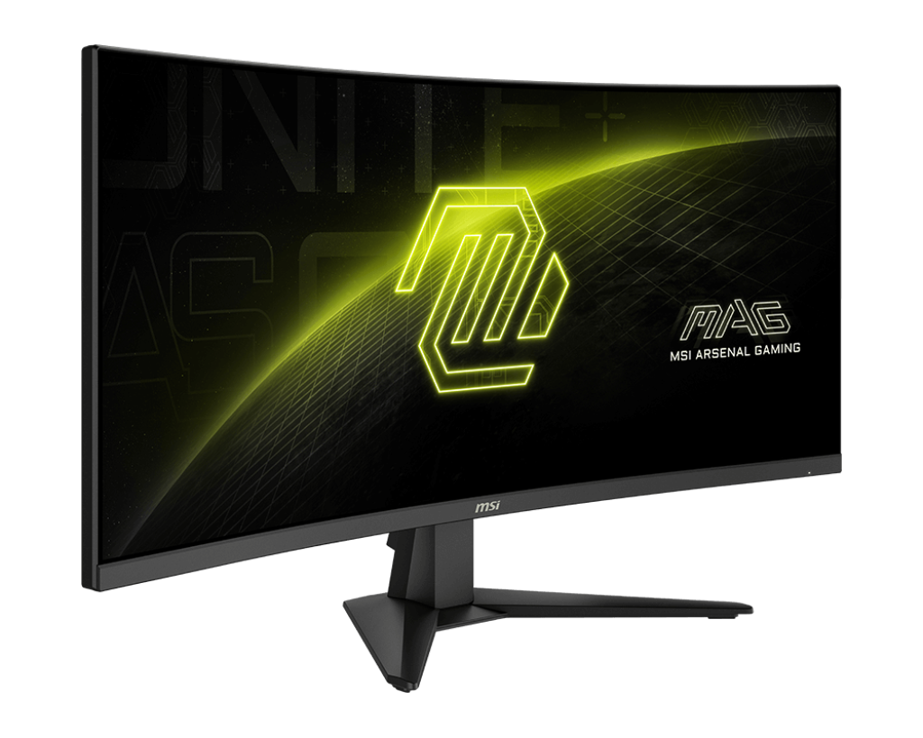 Egy ívelt MSI MAG monitor világító emblémát jelenít meg. A képernyő fekete, sárga díszítéssel. Az állvány fekete.
