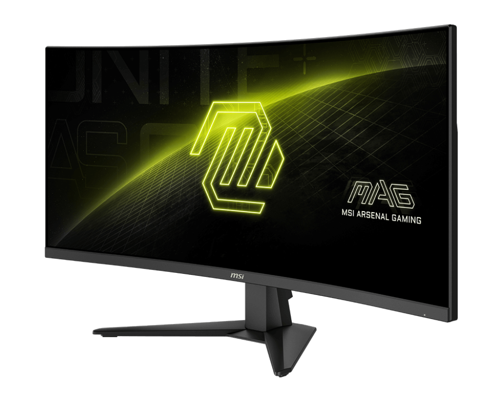 Ívelt MSI gaming monitor. Fekete keret, neon zöld logó és szöveg a képernyőn. Fekete állvány. Fekete háttér.
