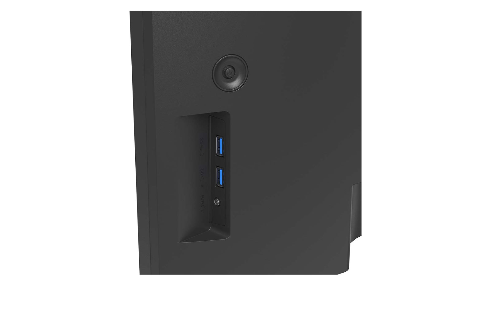 Nahaufnahme der Rückseite eines schwarzen Computermonitors. Zwei USB-Anschlüsse, ein Netzschalter und weitere Anschlüsse sind sichtbar.