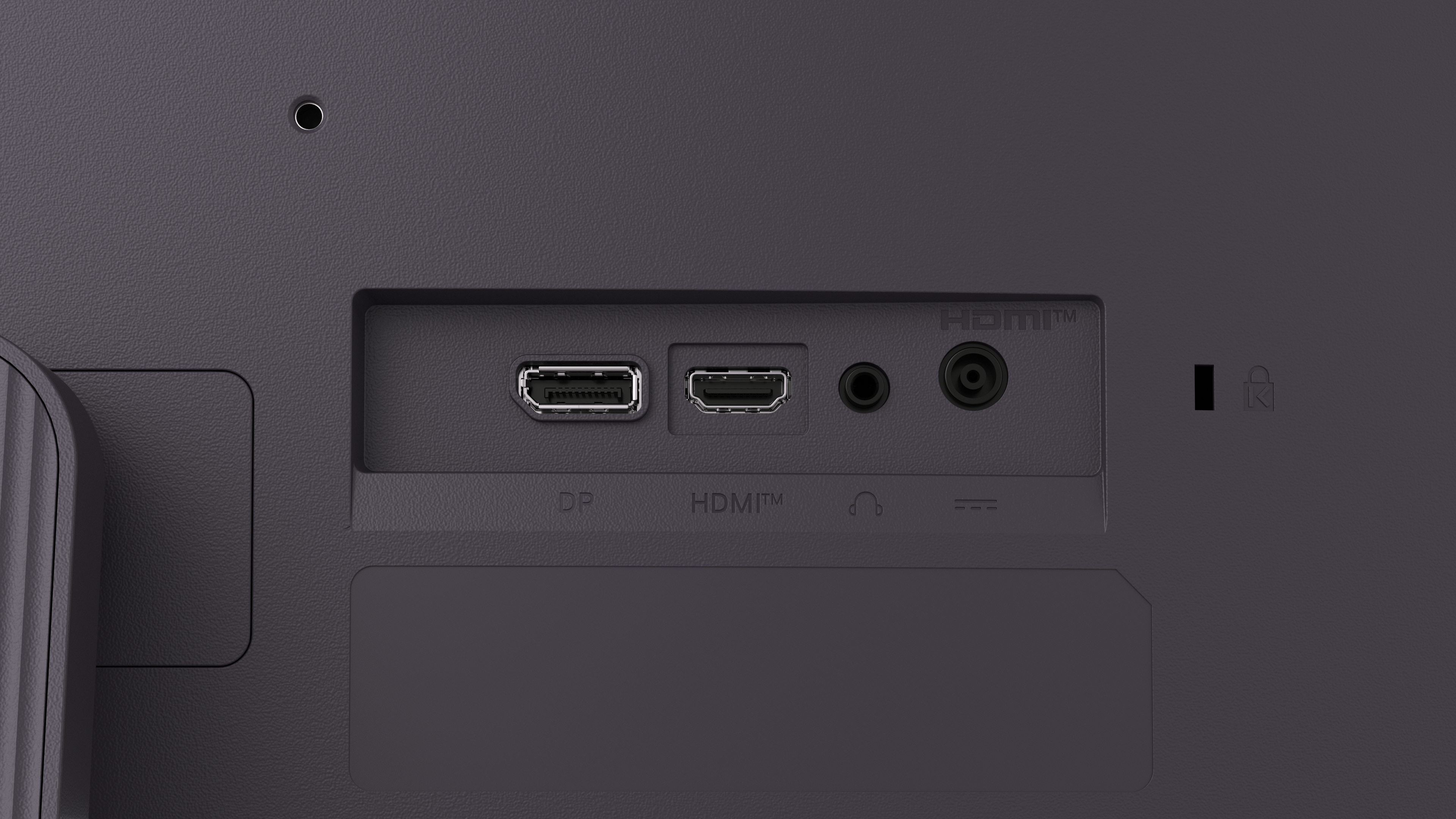 Nahaufnahme der Rückseite eines Monitors. Es zeigt mehrere Anschlüsse: DP, HDMI, Audioanschluss und einen Kensington-Schlitz. Der Hintergrund ist grau.