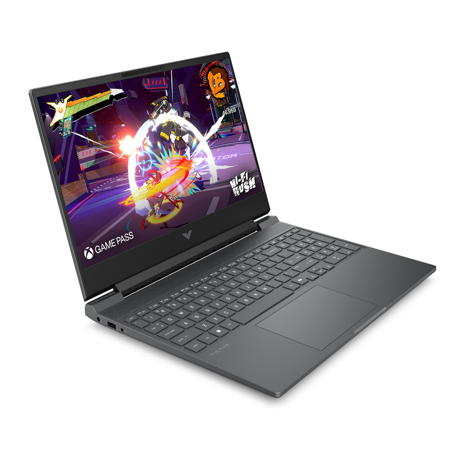 A laptop with a game displayed on the screen. The screen shows a game scene with characters and action. It has a keyboard and touchpad.
