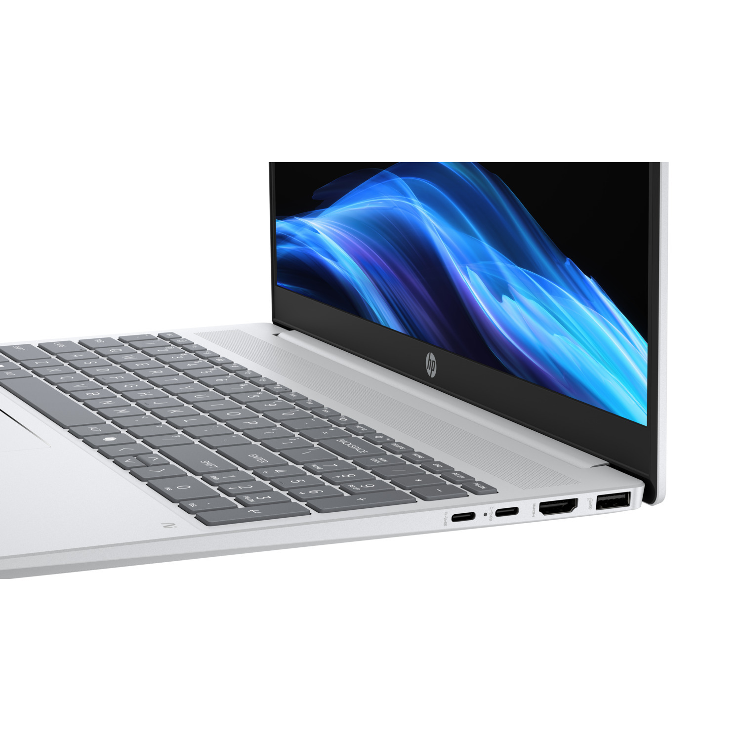 A silver HP laptop is open. The screen displays a blue and white abstract pattern. The keyboard is in focus, and the background is white.