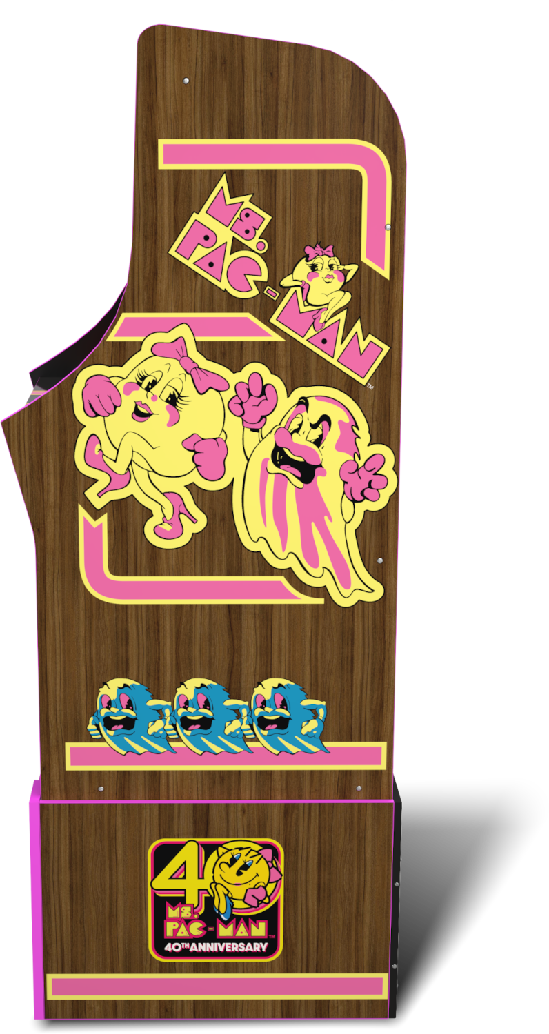 Egy fa textúrájú arcade gép. Ms. Pac-Man karaktereket, 40. évfordulós logót, rózsaszín és sárga díszítéseket tartalmaz.