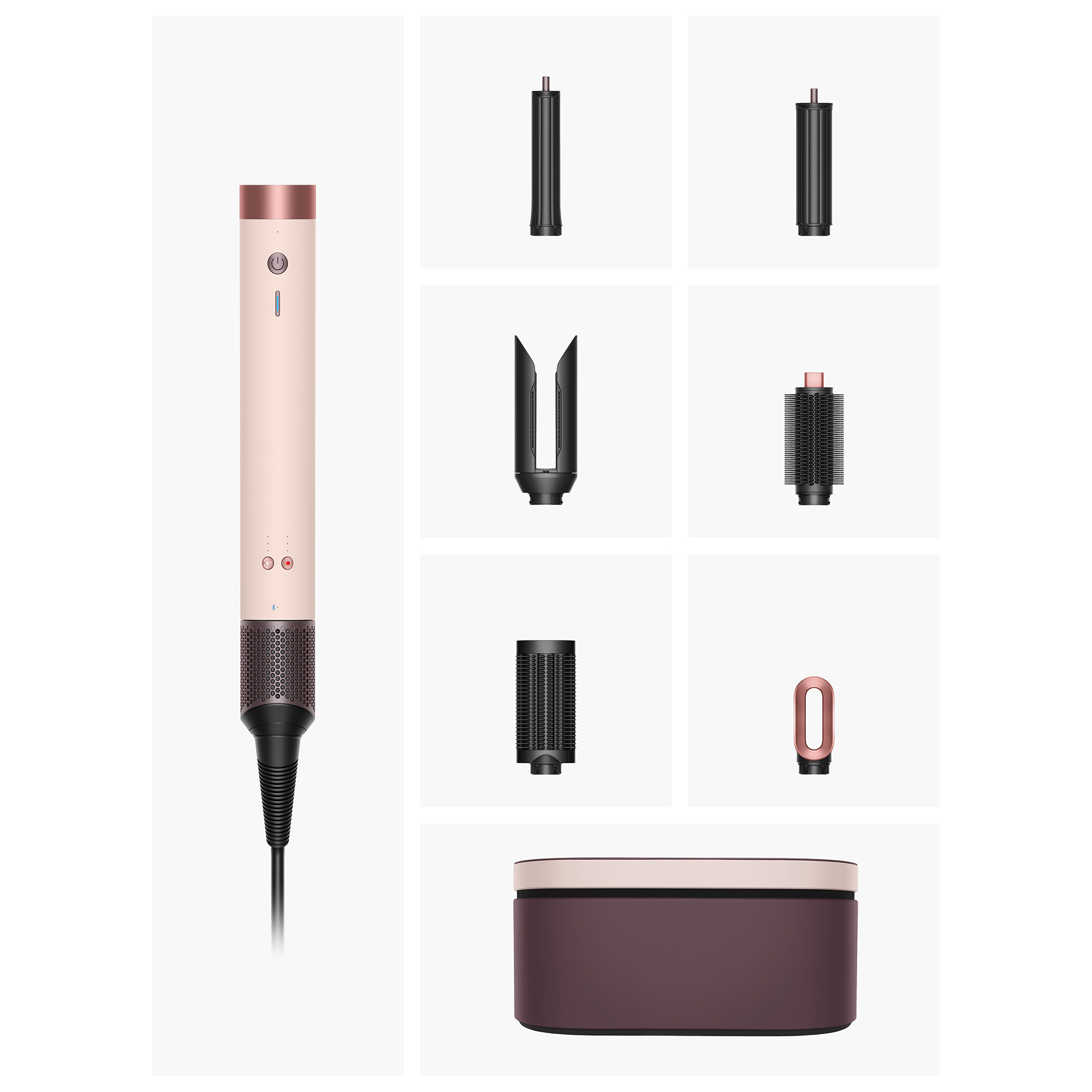 Różowa i miedziana stylizacja włosów z wieloma nasadkami i etui. Wszystko na białym tle.