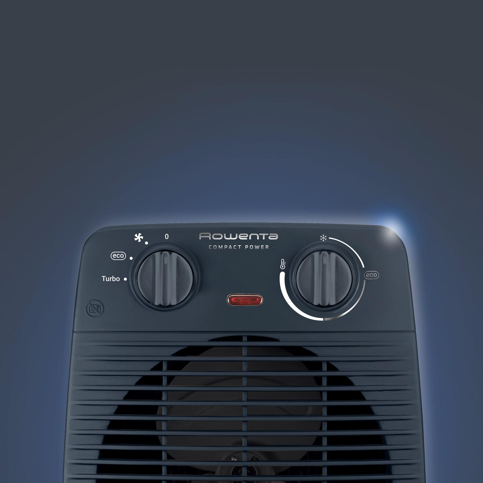 Ein schwarzer Rowenta Compact Power-Heizlüfter mit Drehknöpfen. Der Hintergrund ist ein dunkelblauer Farbverlauf.