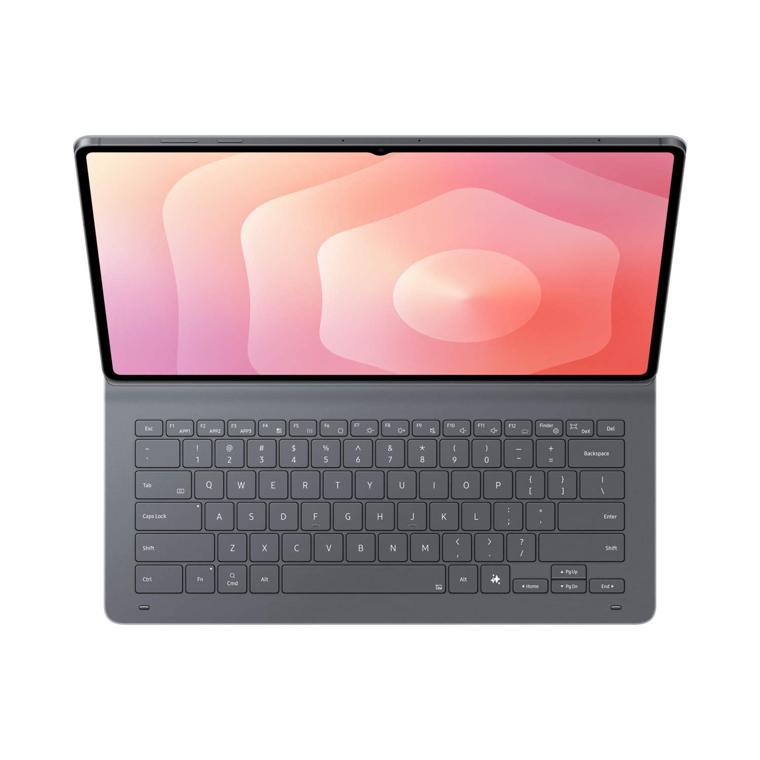 A gray tablet with a keyboard is open. The screen shows a pink and orange gradient. The background is black.