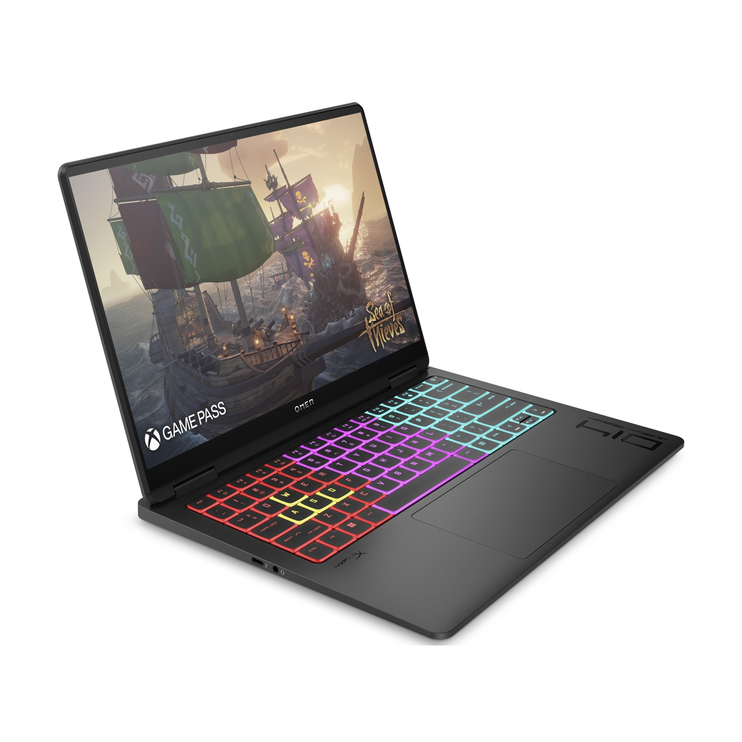 Laptop OMEN nero, schermo che mostra una scena di nave pirata. La tastiera ha retroilluminazione colorata. Logo Xbox Game Pass visibile.