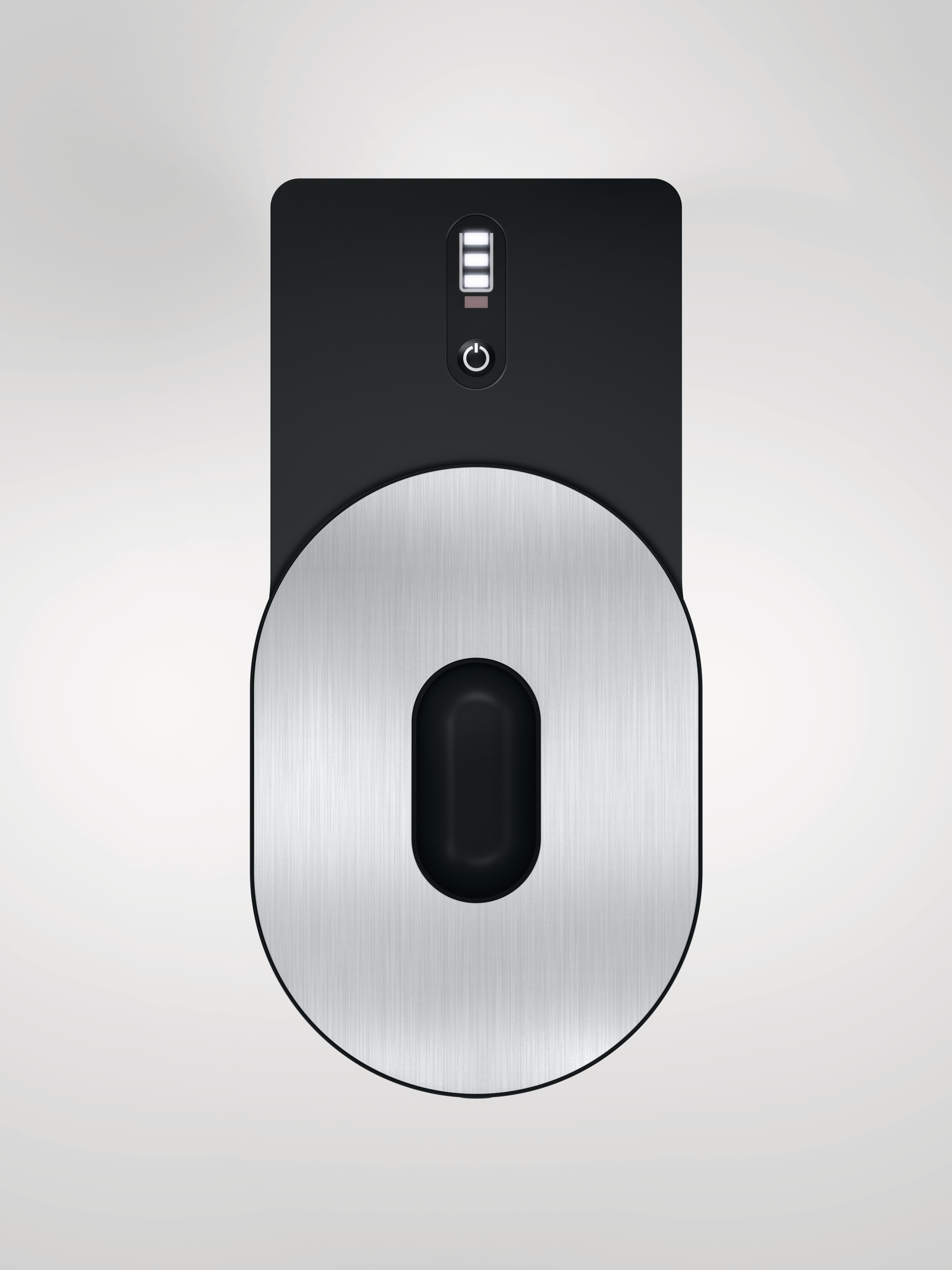 Ein schwarzes und silbernes Gerät, möglicherweise ein Roboterstaubsauger, mit Ein-/Aus-Taste und Batteriestandsanzeige.