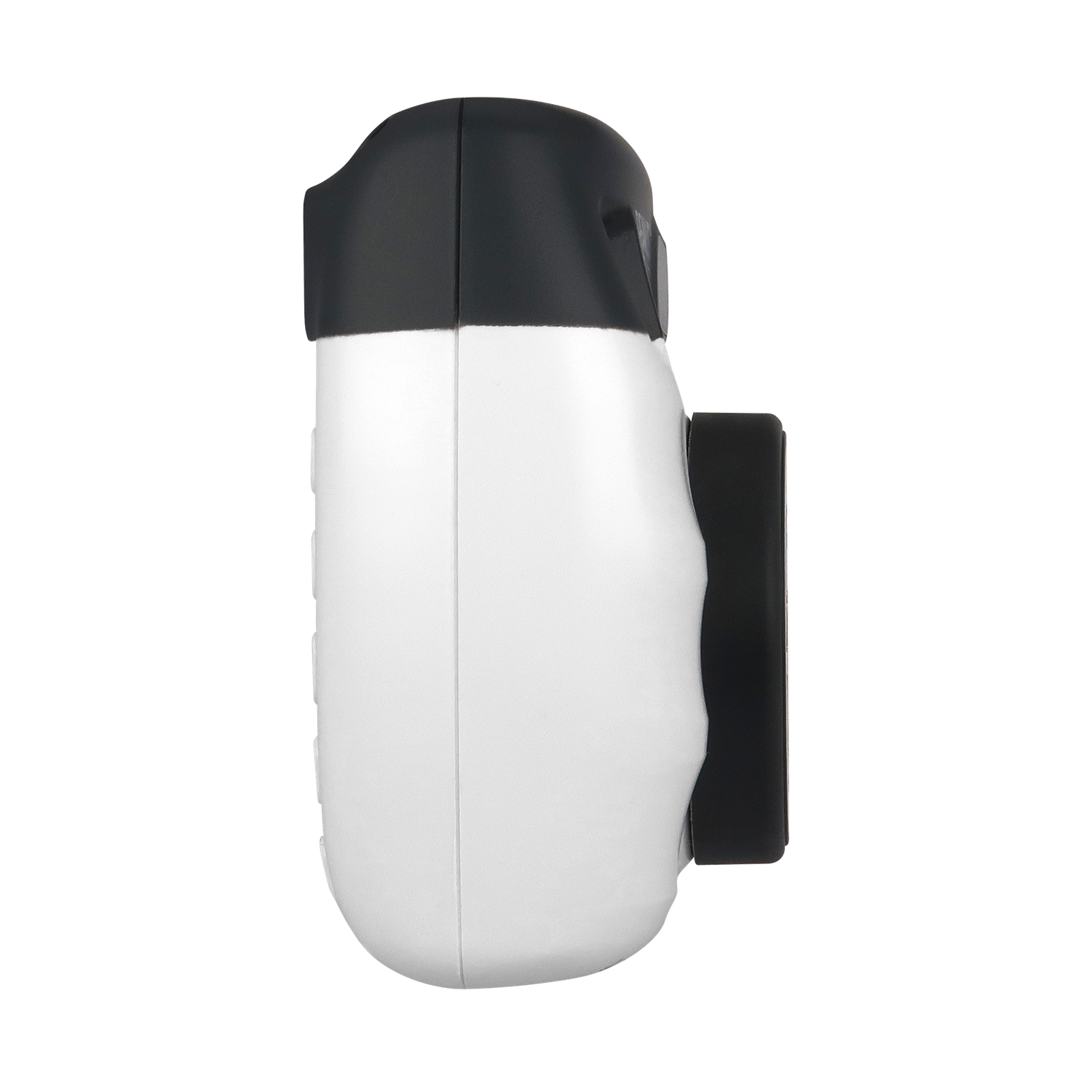 Un appareil blanc et noir, peut-être un haut-parleur ou un gadget similaire, sur fond noir. C'est une vue de côté.