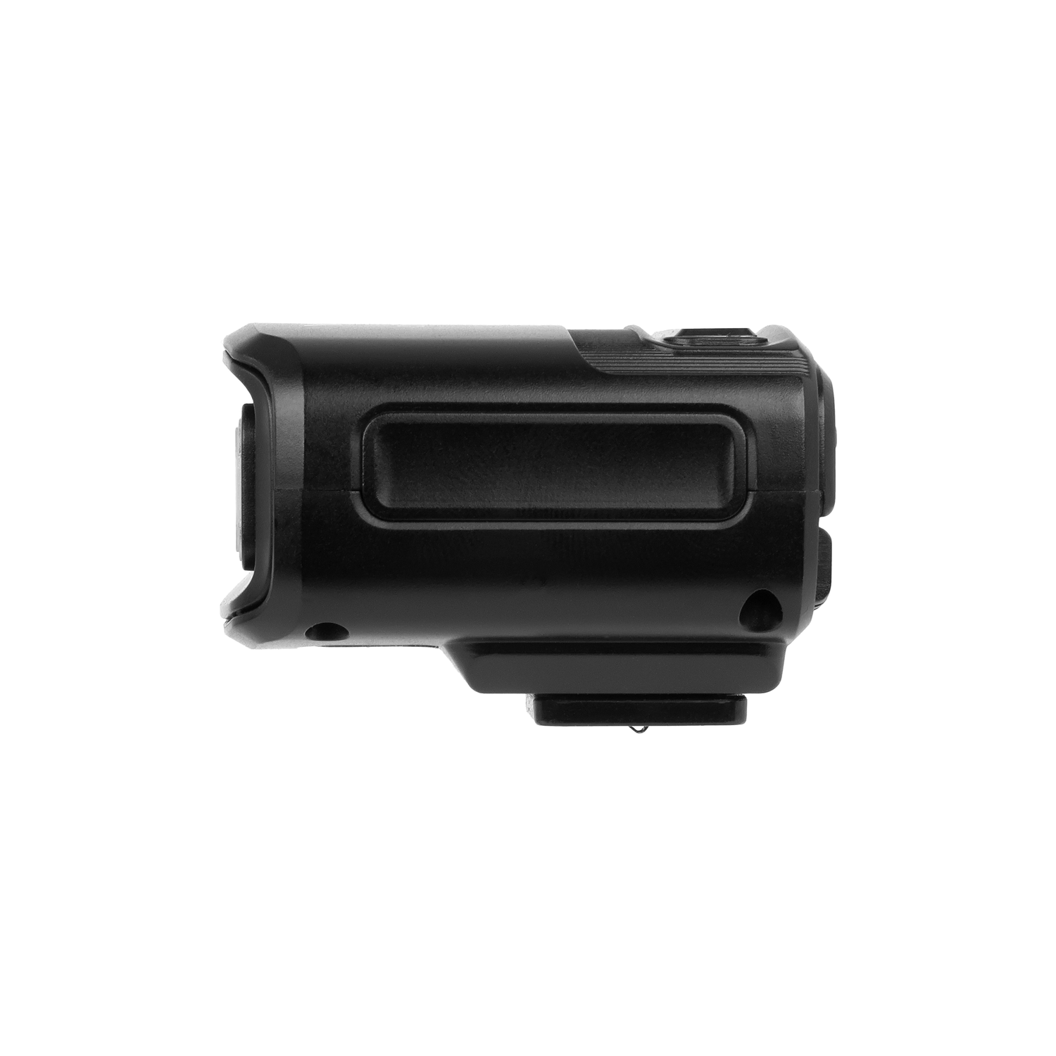 Un appareil noir, possiblement une caméra ou un enregistreur, est posé horizontalement sur fond blanc. Il a une forme rectangulaire aux bords arrondis.
