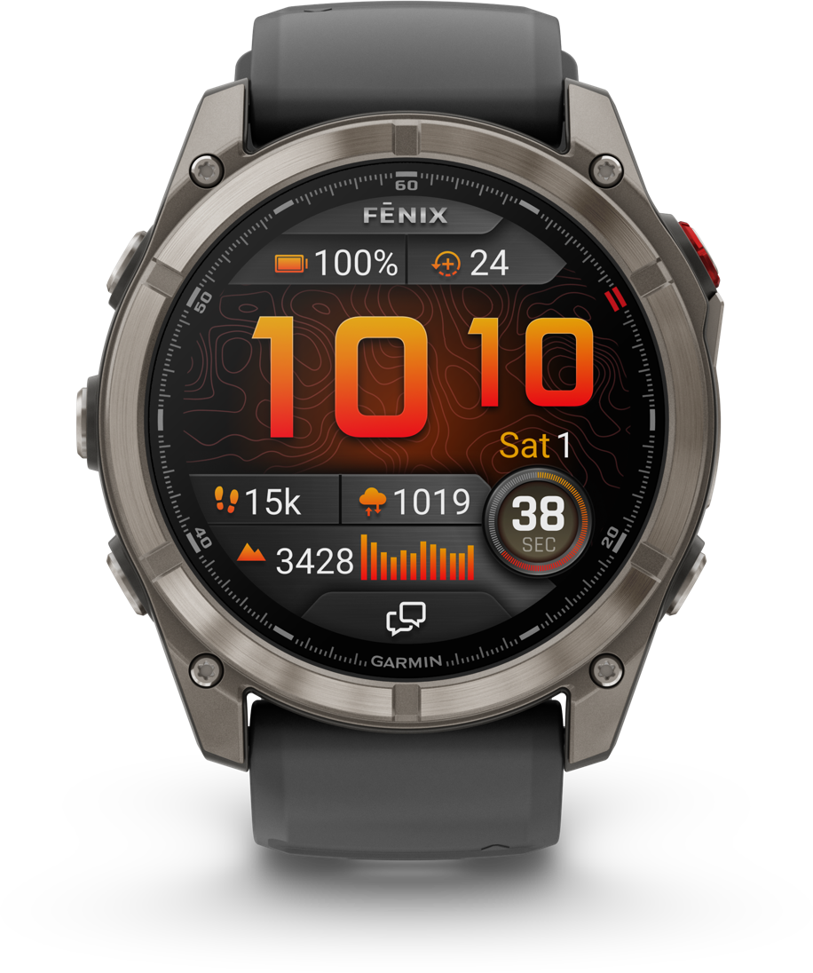 Montre connectée grise avec cadran sombre affichant 1010, 100% batterie, 24, 15k pas, 1019 hPa, 38 sec.