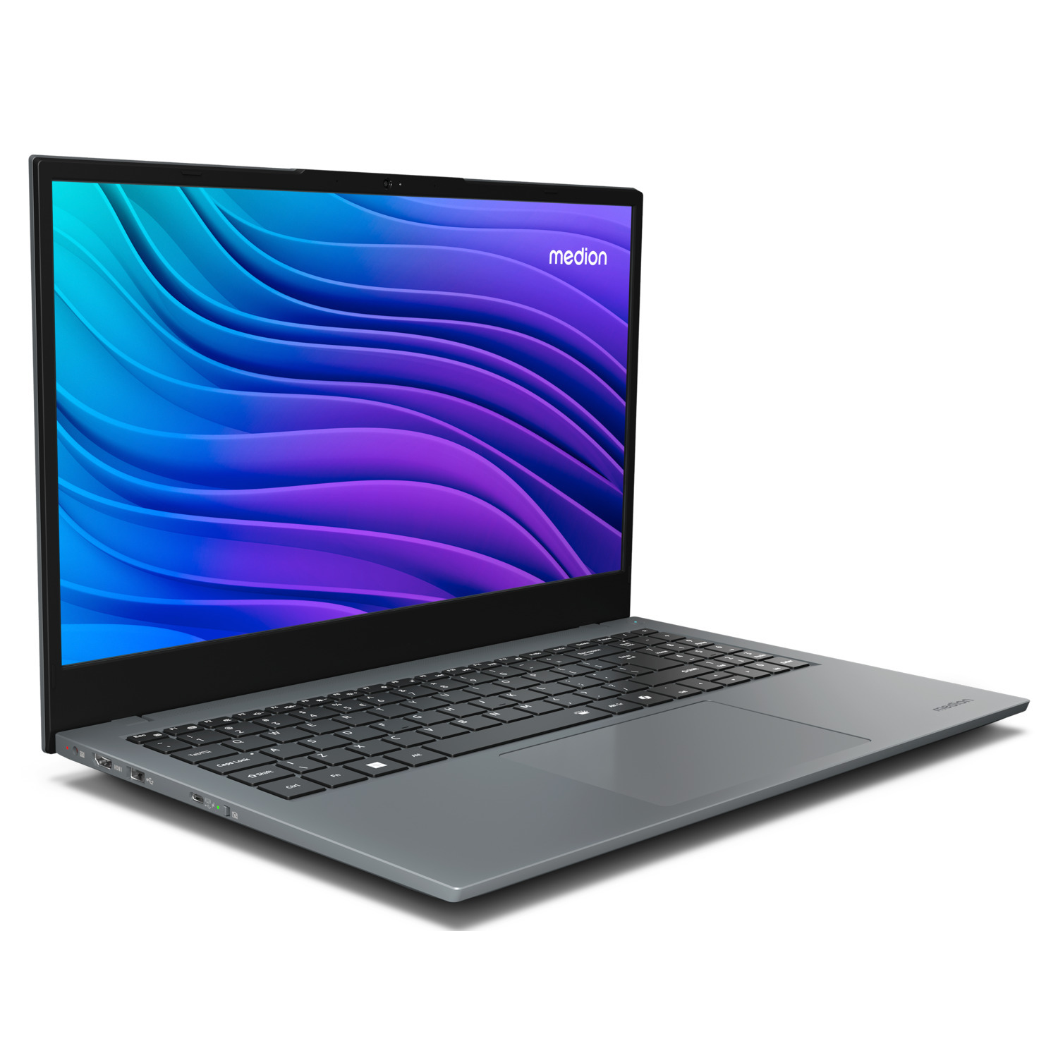 Un ordinateur portable Medion gris est affiché en angle. L'écran affiche un motif ondulé bleu et violet. Le clavier est noir.