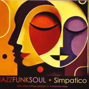 Abstrakte Kunst mit zwei Gesichtern. Eines in Gelb, Rot und Schwarz, das andere in Lila und Schwarz. Titel: Jazzfunksoul Simpatico.