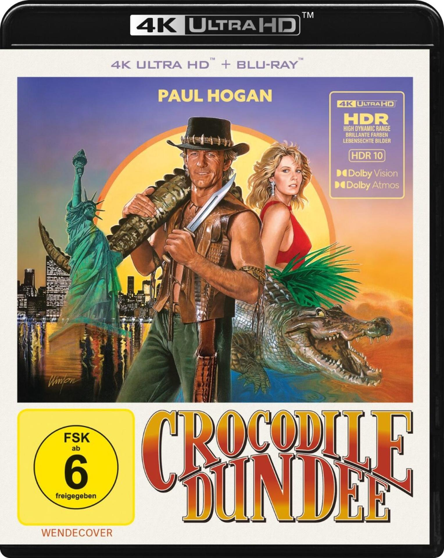 Filmcover: Paul Hogan mit Krokodil, Freiheitsstatue und Titel 'Crocodile Dundee'. Enthält HDR und Altersfreigabe.