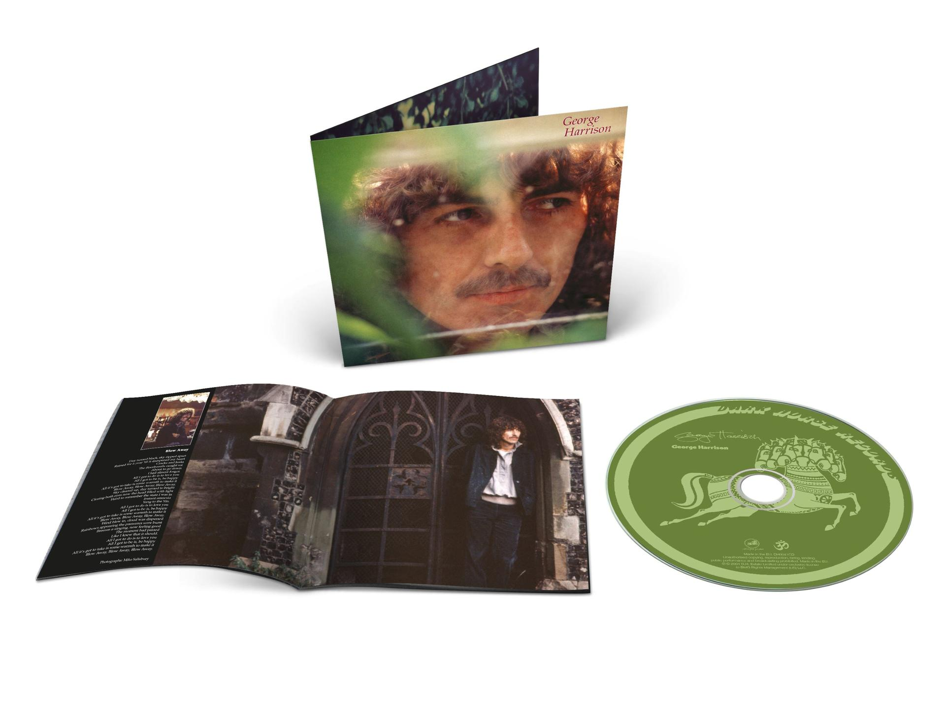 Albumcover von George Harrison. Enthält eine CD, ein Albumcover mit Harrisons Gesicht und ein offenes Booklet mit Texten und Foto.