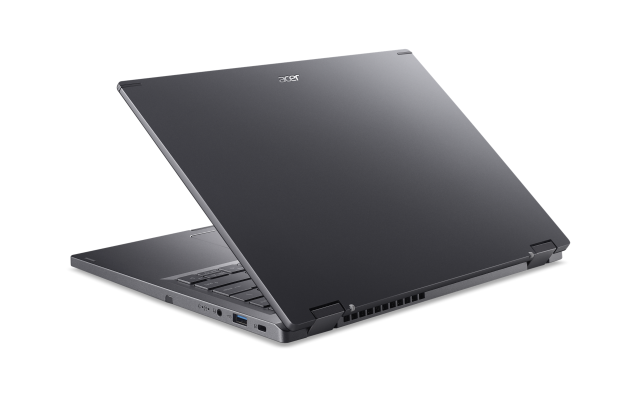 Ein dunkelgraues Acer-Laptop ist auf weißem Hintergrund geöffnet. Der Bildschirm ist zurückgekippt und zeigt die Tastatur und Anschlüsse.