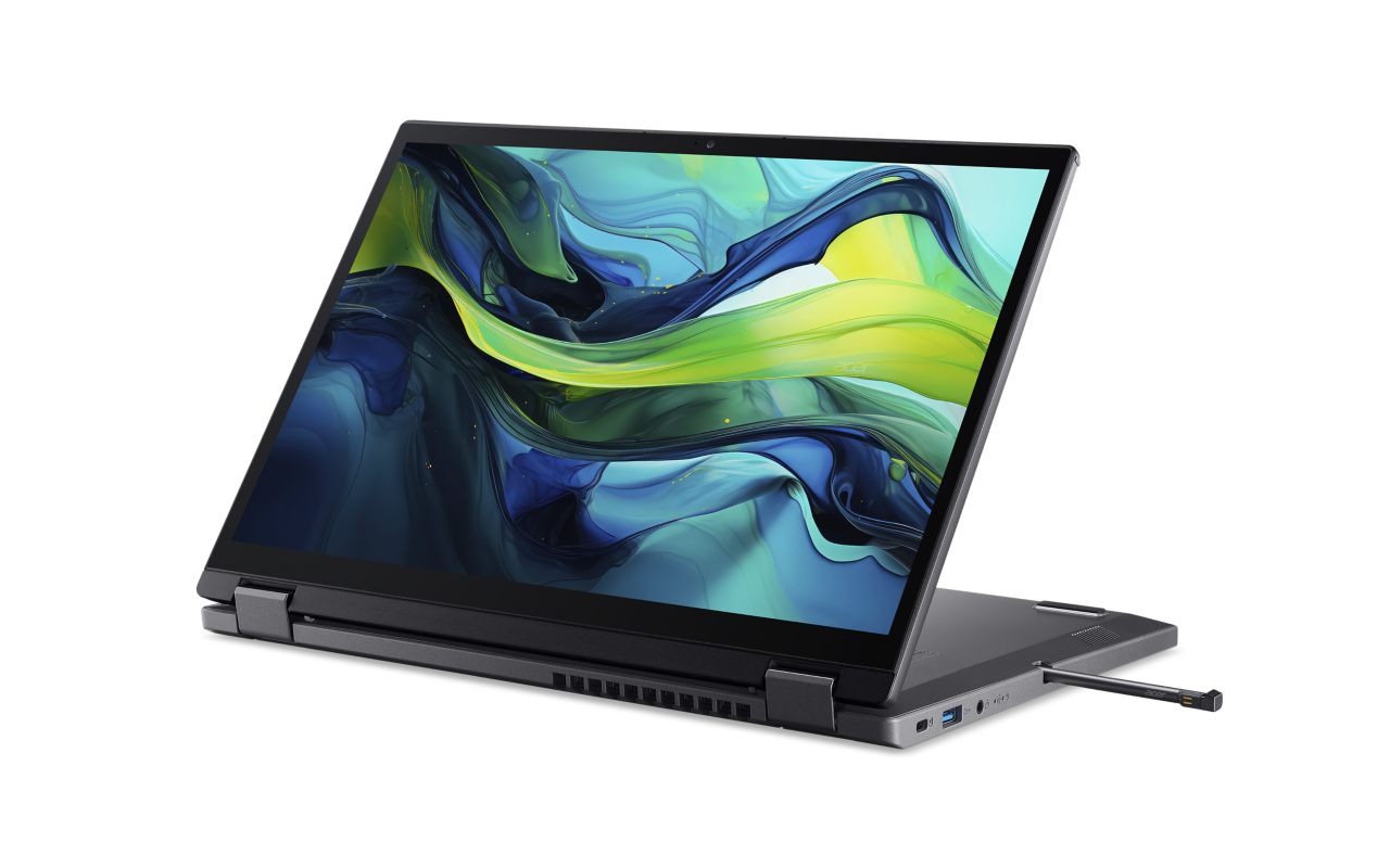 Ein schwarzer Acer-Laptop ist geöffnet. Der Bildschirm zeigt ein farbenfrohes abstraktes Design. Ein Stift ist angebracht.