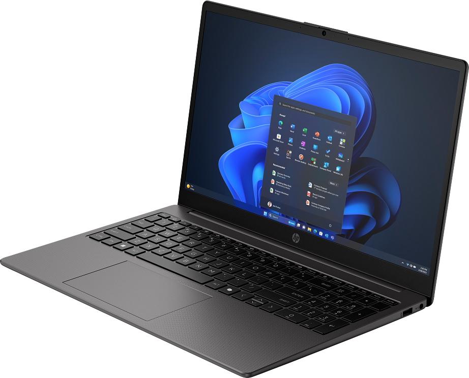 Egy szürke HP laptop nyitva, a Windows 11 start menüt mutatja. A billentyűzet fekete, a képernyő kék absztrakt háttérképet jelenít meg.
