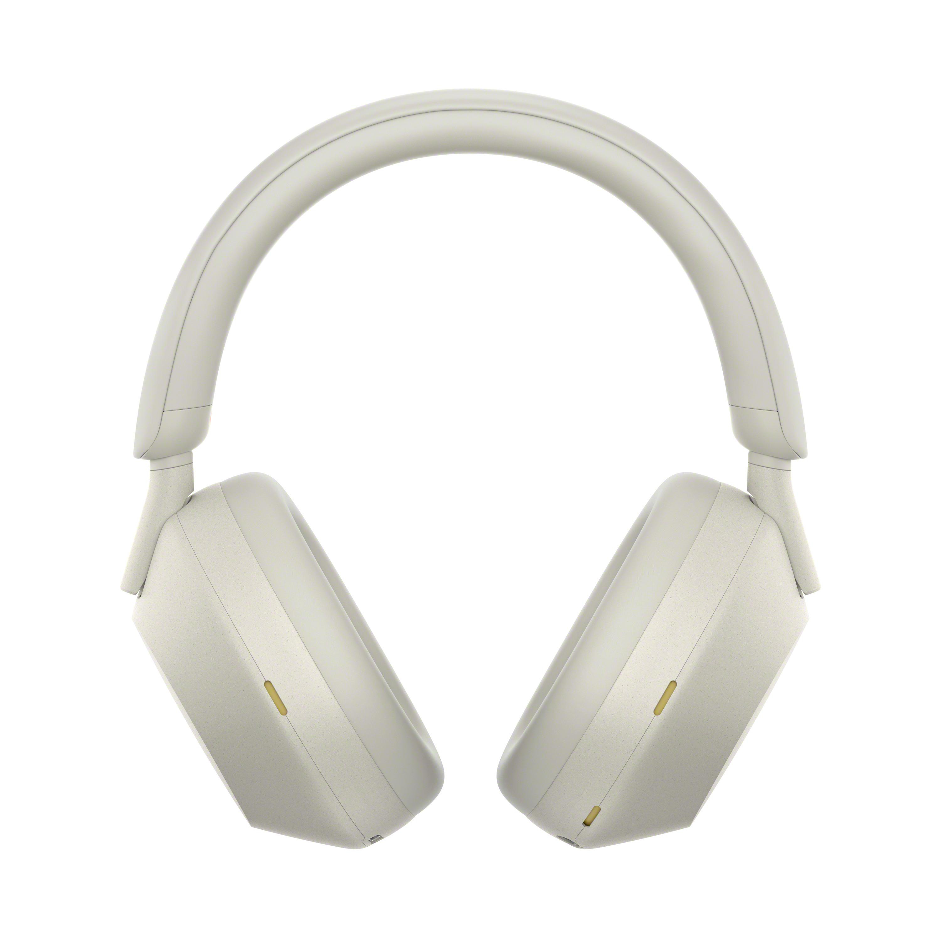 Cremefarbene Kopfhörer auf weißem Hintergrund. Die Kopfhörer sind Over-Ear-Stil.