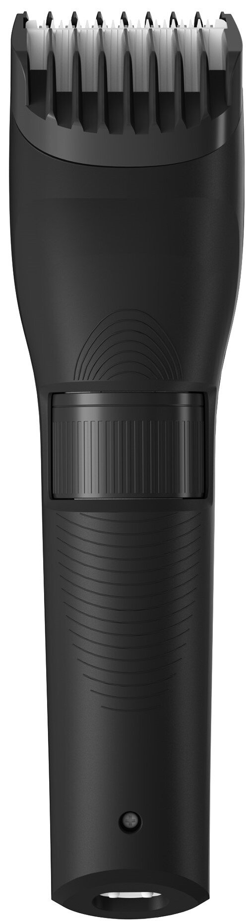 Zbliżenie czarnej maszynki do brody. Głowica trymera ma zęby. Ma pokrętło regulacji i przycisk zasilania.