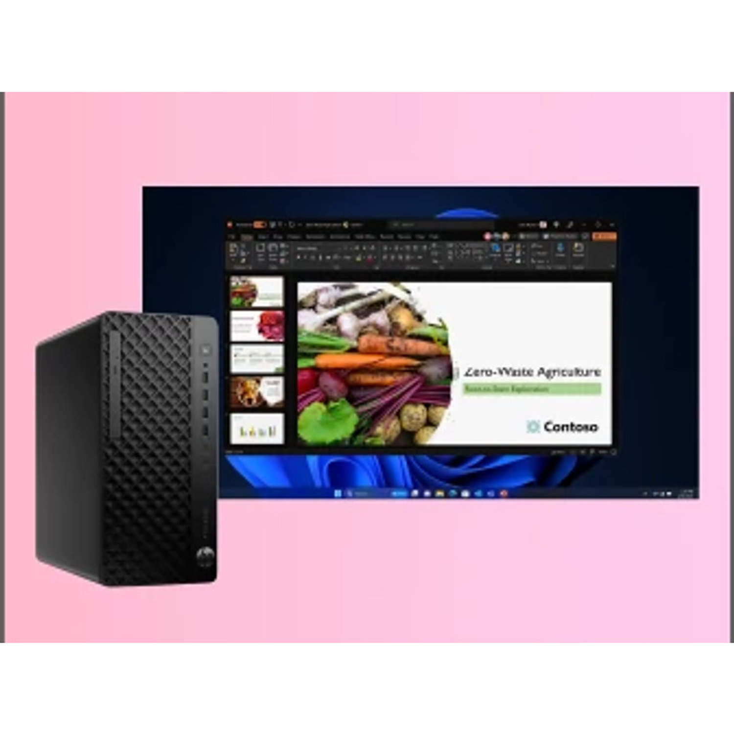 Een zwarte desktopcomputer naast een monitor met een presentatie over afvalvrije landbouw. Roze achtergrond.