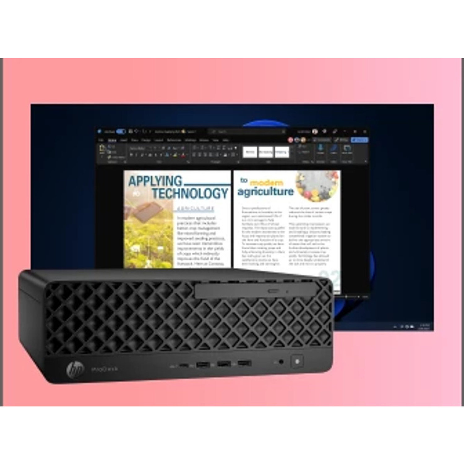 A black HP ProDesk desktop computer sits in front of a monitor displaying text about applying technology to agriculture.