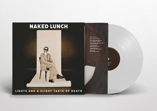 Albumcover von 'Naked Lunch'. Mann im Anzug sitzt auf einem Stuhl. Vinyl-Schallplatte sichtbar, teilweise aus der Hülle.
