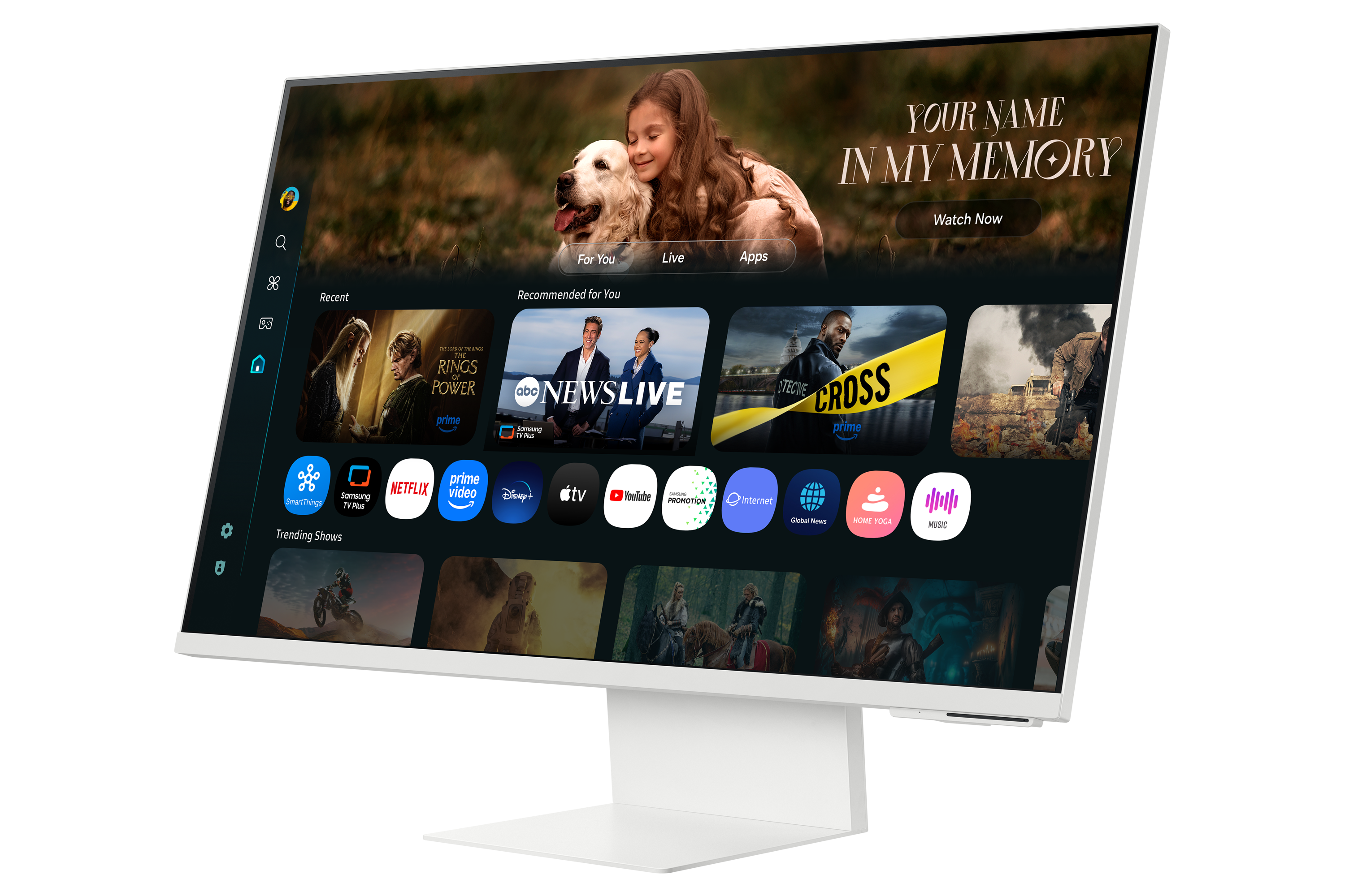 Biały monitor wyświetla interfejs Smart TV z różnymi ikonami aplikacji i rekomendacją filmu.