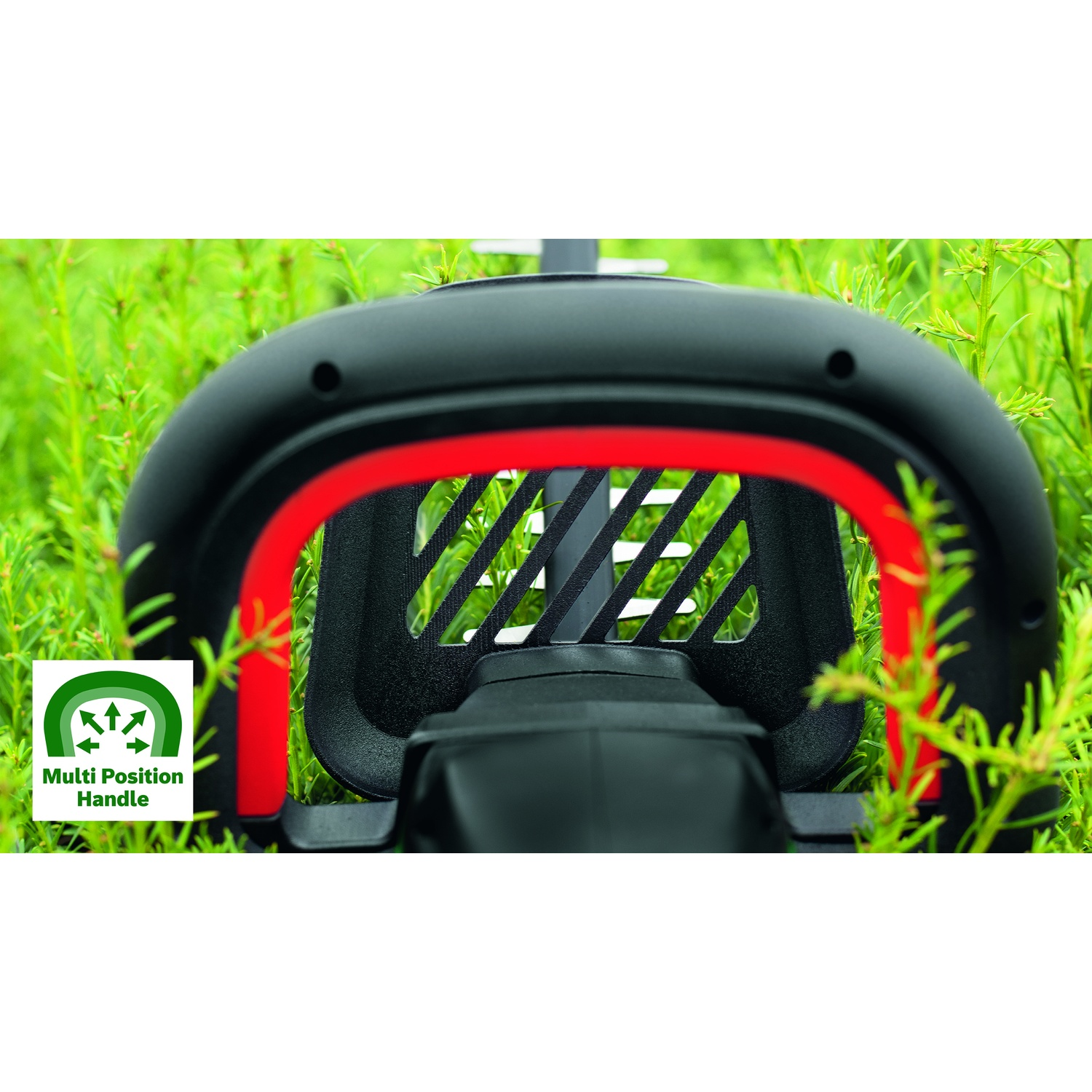 Primo piano di un oggetto nero e rosso sull'erba verde. Un logo Multi Position Handle è visibile a sinistra.