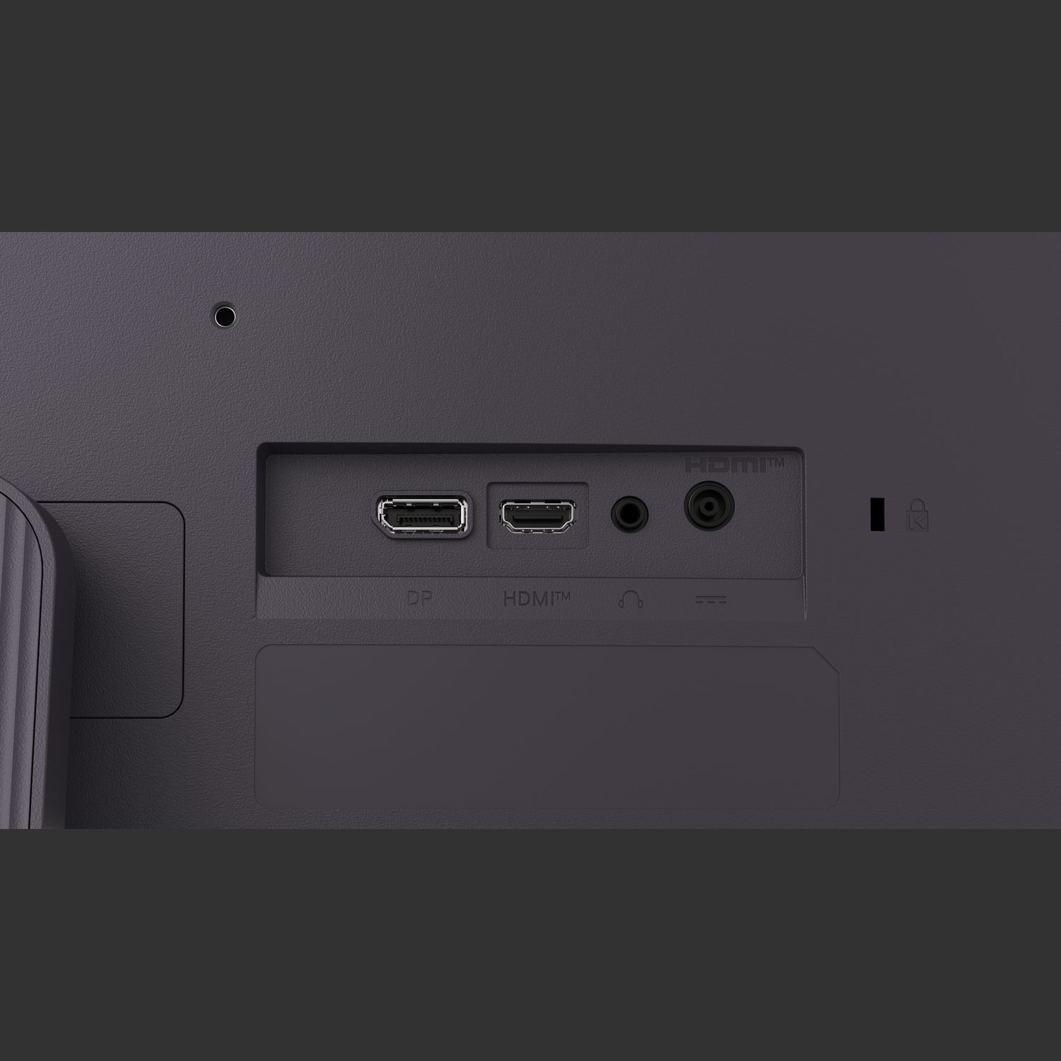 Close-up of a monitor's back panel. Ports include DP, HDMI, audio, and power, with a lock symbol. Gray color.