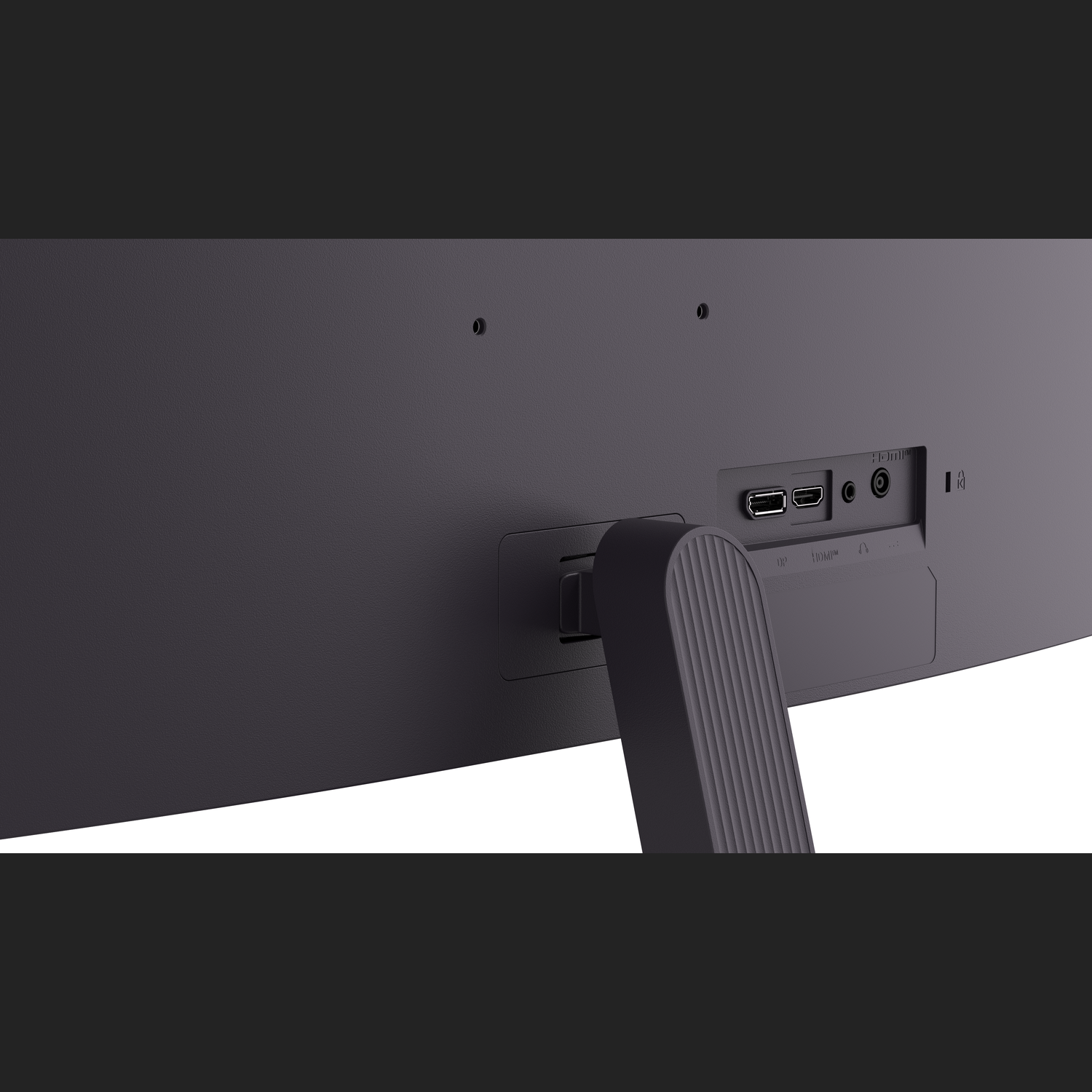 The back of a black monitor. Ports include HDMI, USB, and audio jacks. A stand is attached. White background.
