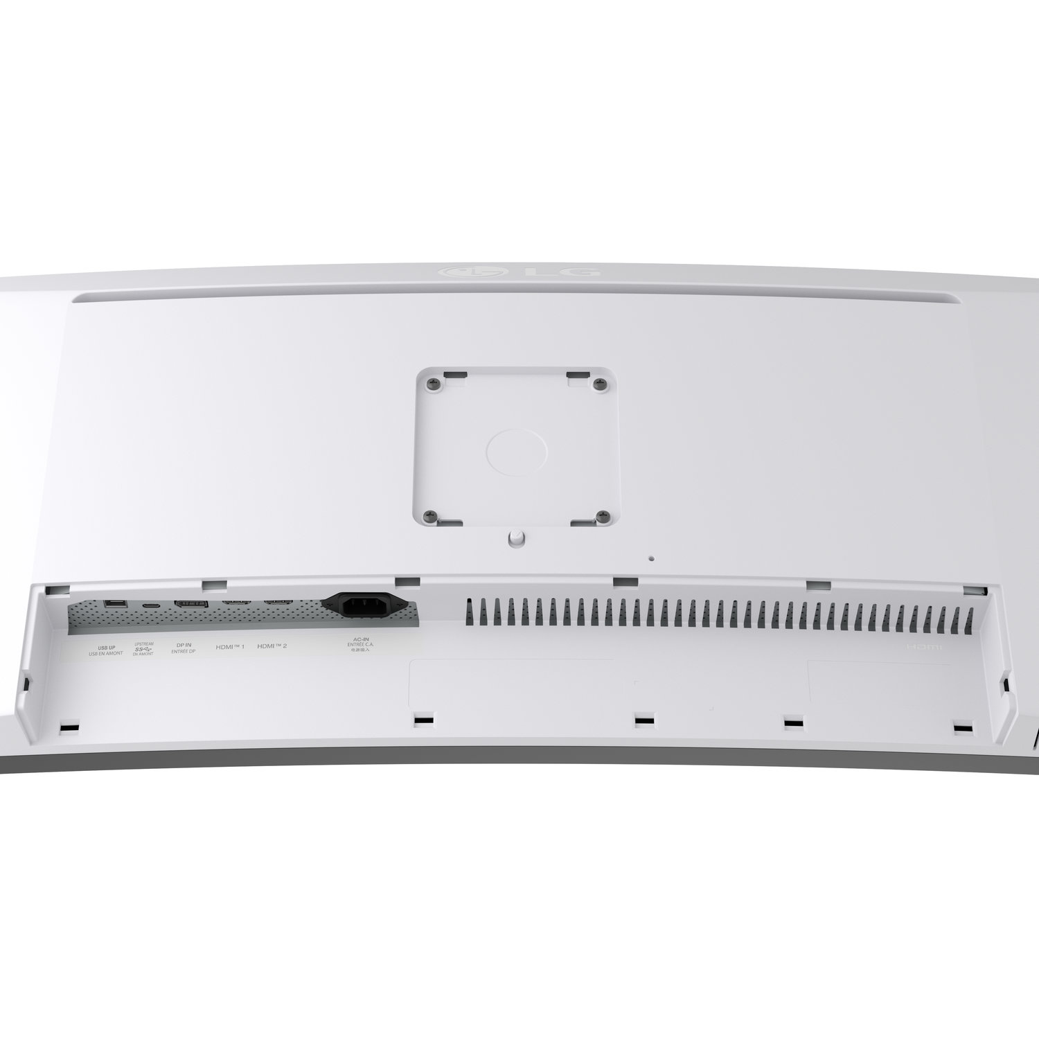 The back of a white computer monitor is visible, showing ports for USB, HDMI, and power input, along with ventilation slots.