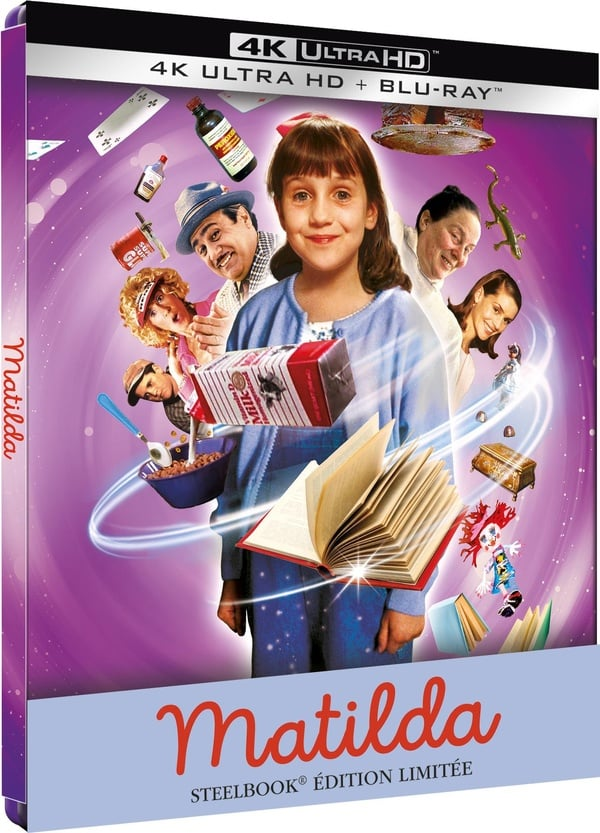 Matilda dvd-hoes. Meisje houdt melkpak vast, omringd door zwevende objecten en personages. Titel: 'Matilda Steelbook Edition'.