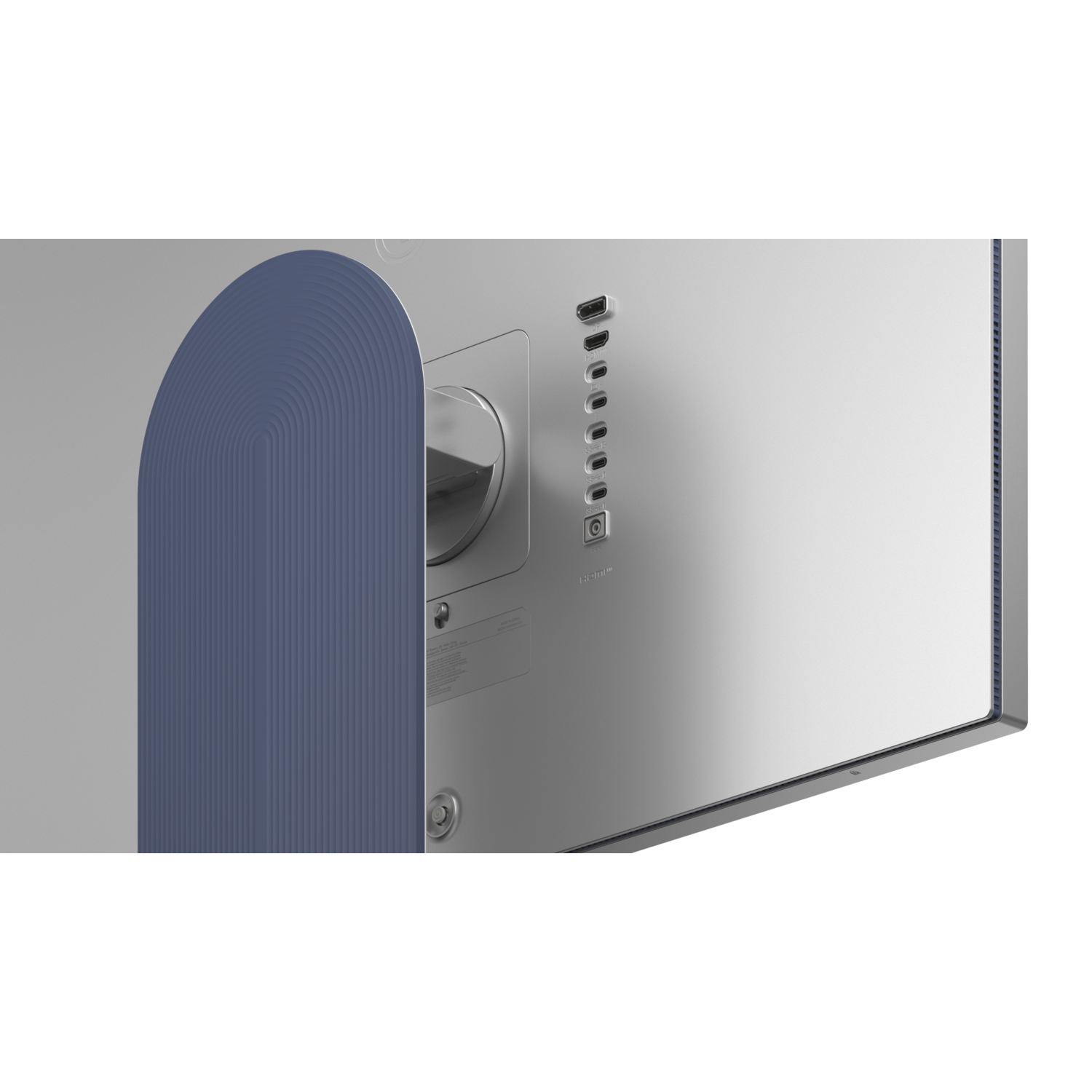 The back of a silver computer monitor with various ports. A blue textured panel is on the left.