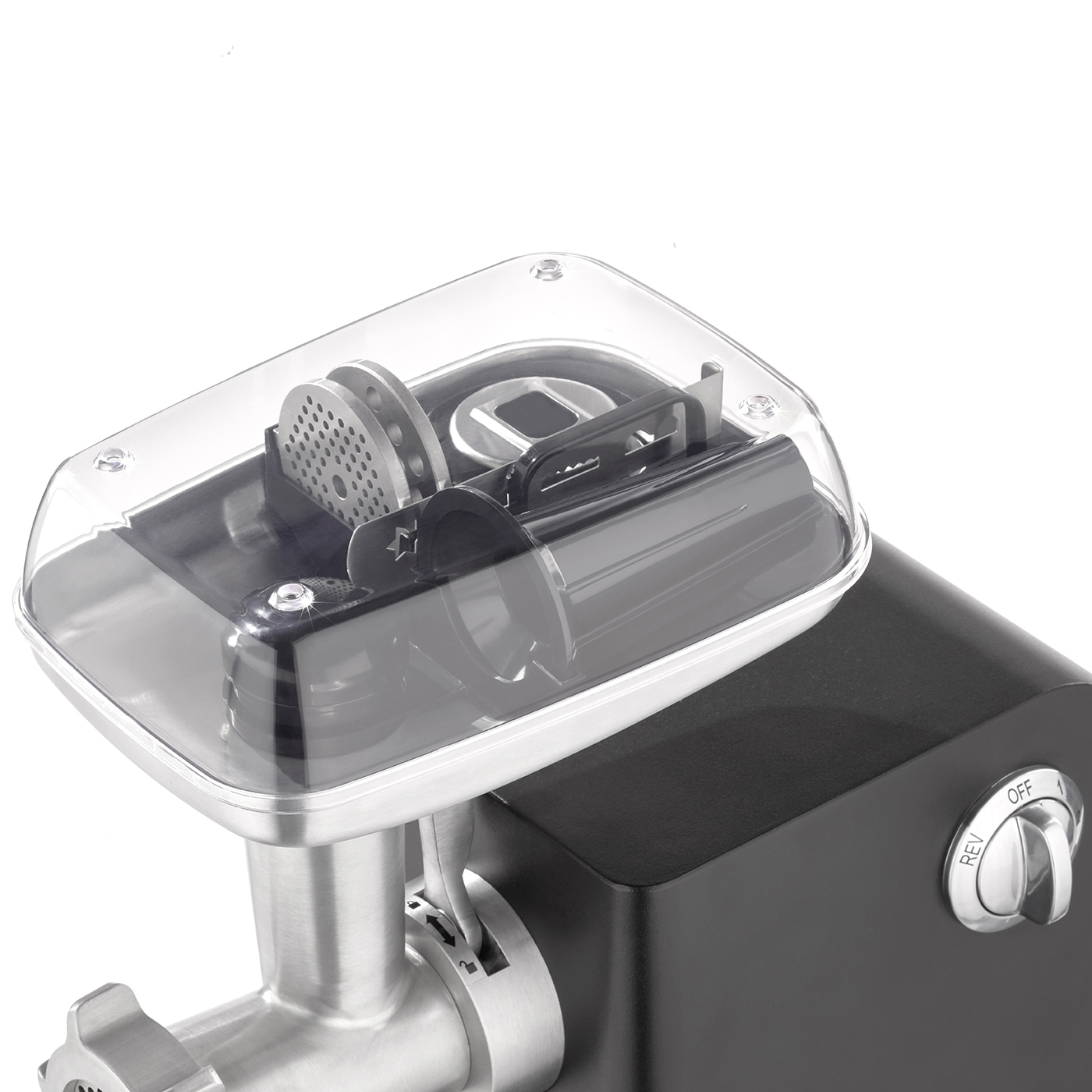 Maszynka do mięsa z przezroczystą plastikową osłoną, pokazująca elementy wewnętrzne. Czarna podstawa ze srebrnymi elementami sterującymi. Srebrna metalowa głowica mieląca.