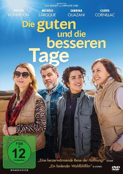 Filmposter mit vier lächelnden Personen. Titel auf Deutsch. Hintergrund ist Wüste mit blauem Himmel. Personen tragen Westen.