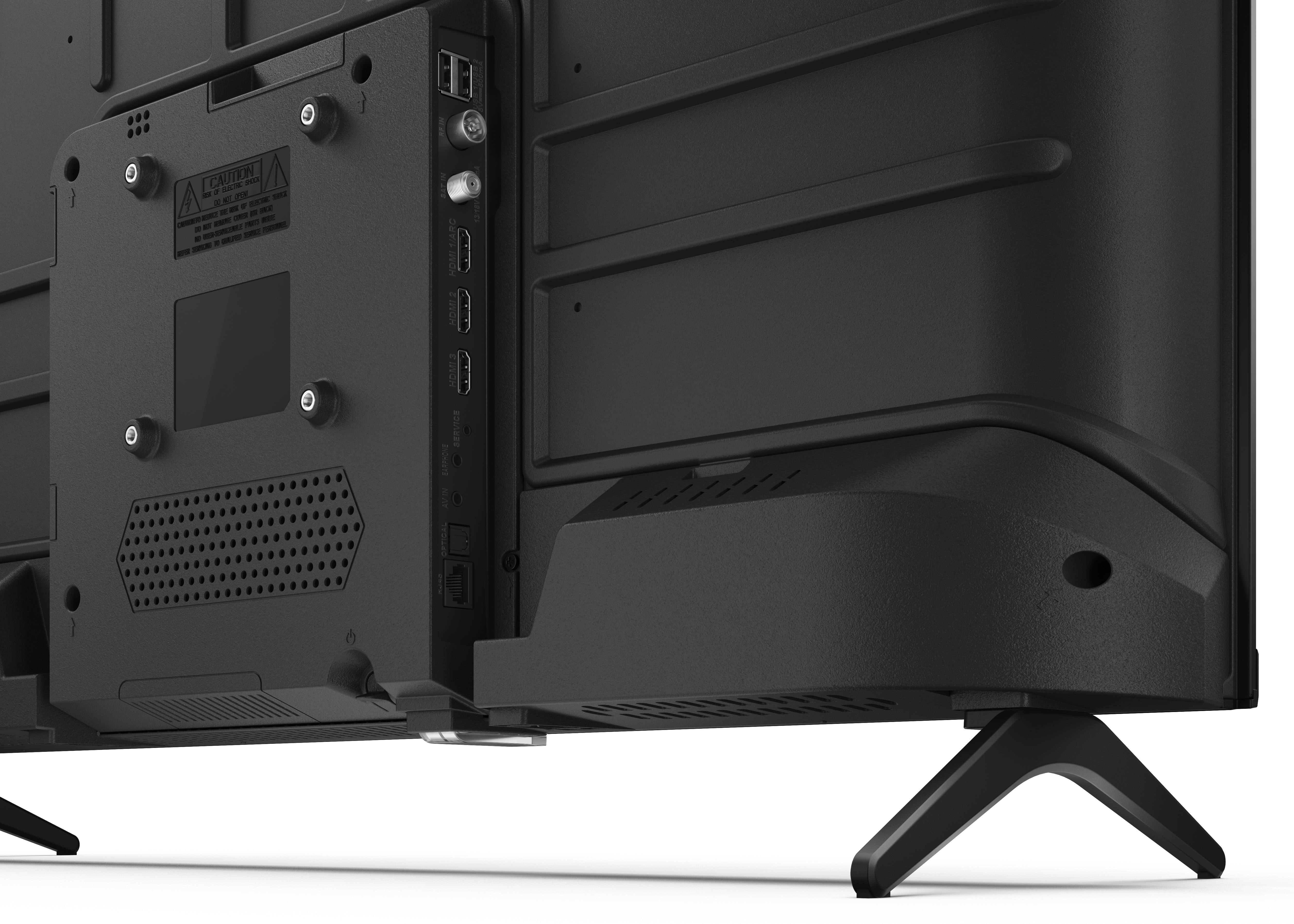 Zbliżenie tyłu czarnego telewizora z portami, etykietą ostrzegawczą i podstawą.