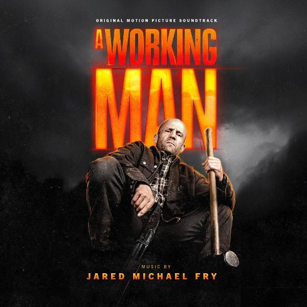Ein Mann sitzt mit Werkzeug. Titel: A WORKING MAN. Musik von Jared Michael Fry.